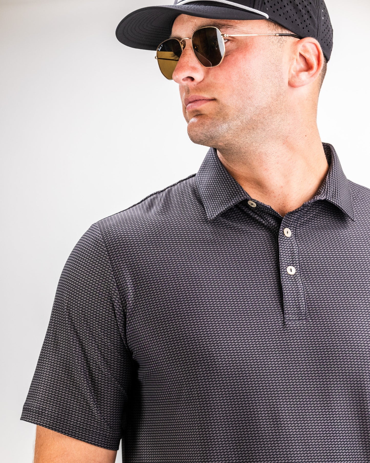 Player Preferred™ Polo in Night Wave, showcasing a stylish design with a deep blue color and a modern fit.
