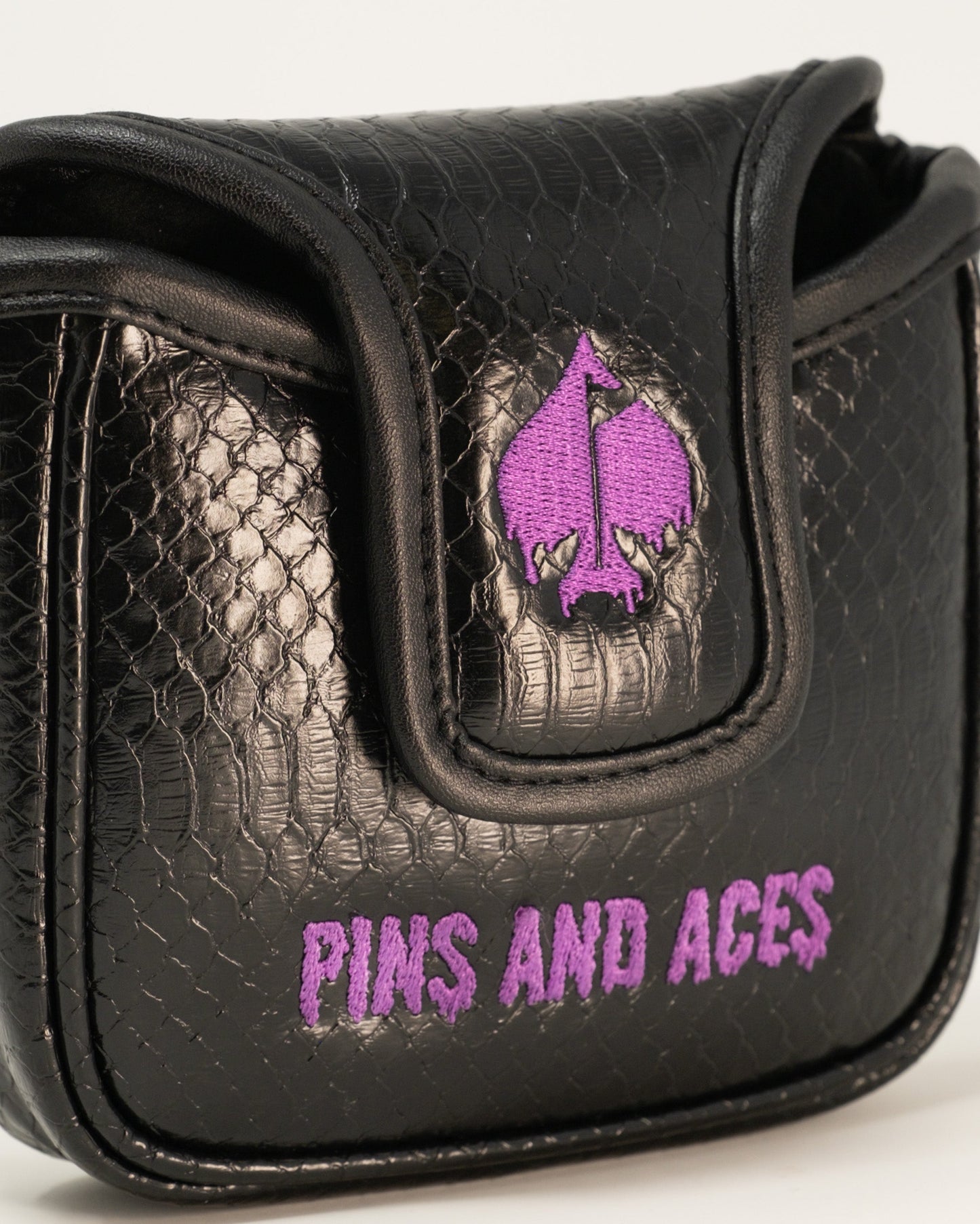 Venom mallet cover featuring a sleek design with a vibrant venomous snake graphic, ideal for golf clubs.