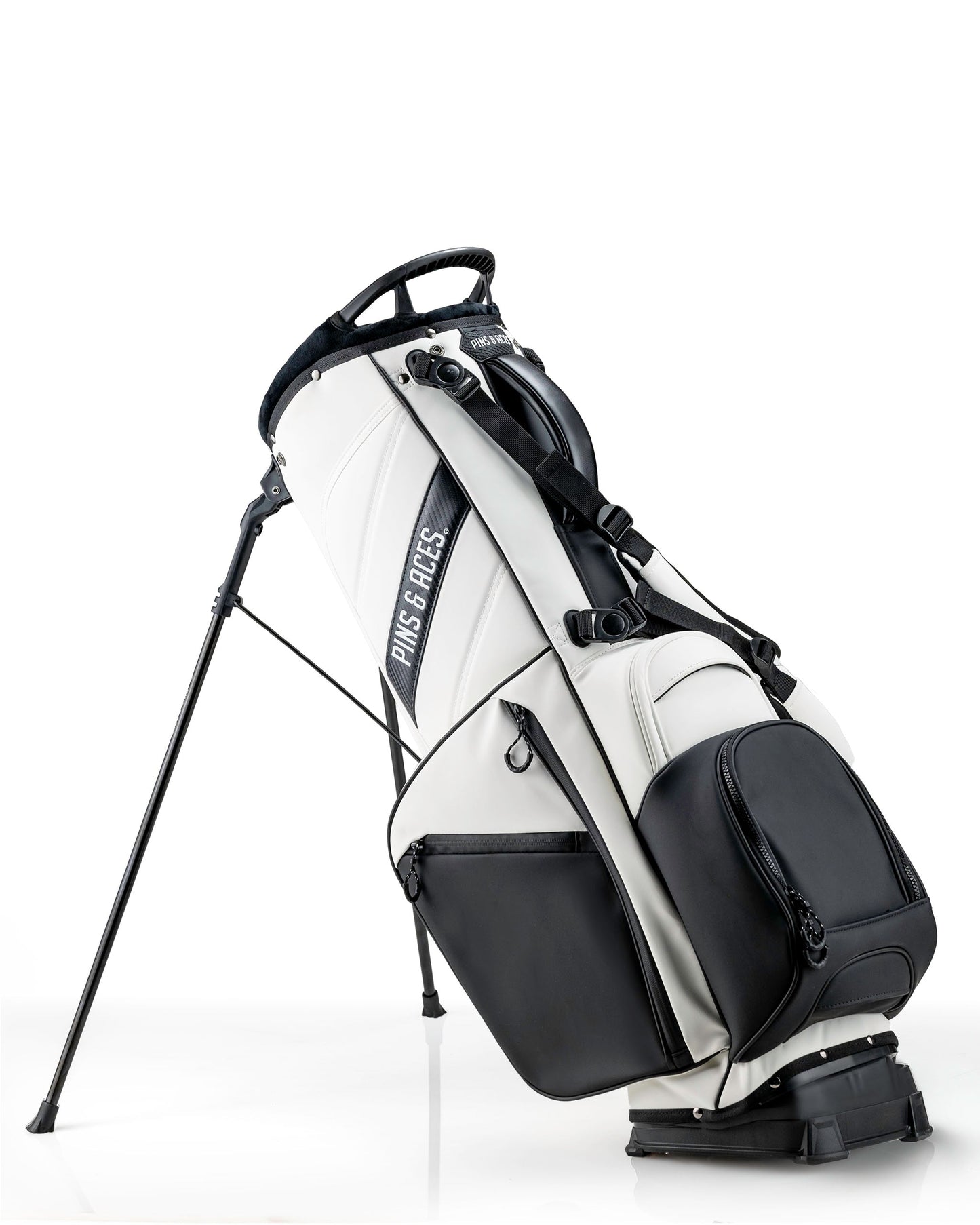 Stylish Player Preferred Golf Bag in white and black, featuring a sleek design and sturdy stand for golfers.