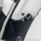 Stylish Player Preferred Golf Bag in white and black featuring a side pocket for a water bottle and bold logo.