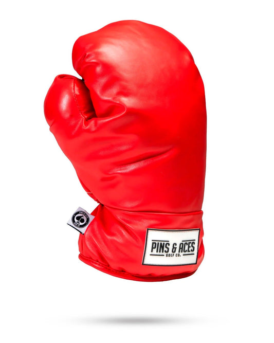 Red boxing glove driver cover for golf clubs, featuring a snug fit and durable construction.