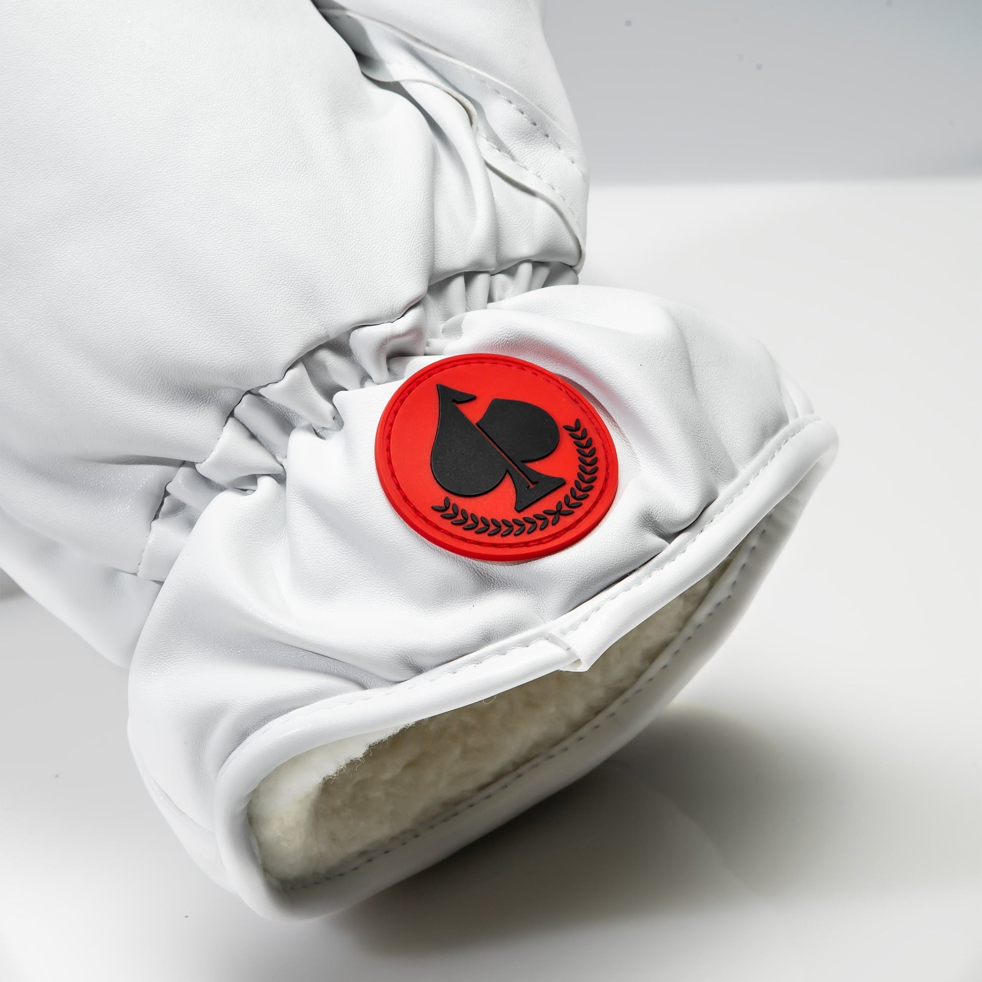 White boxing glove driver cover for golf clubs, featuring a sleek design and durable material.