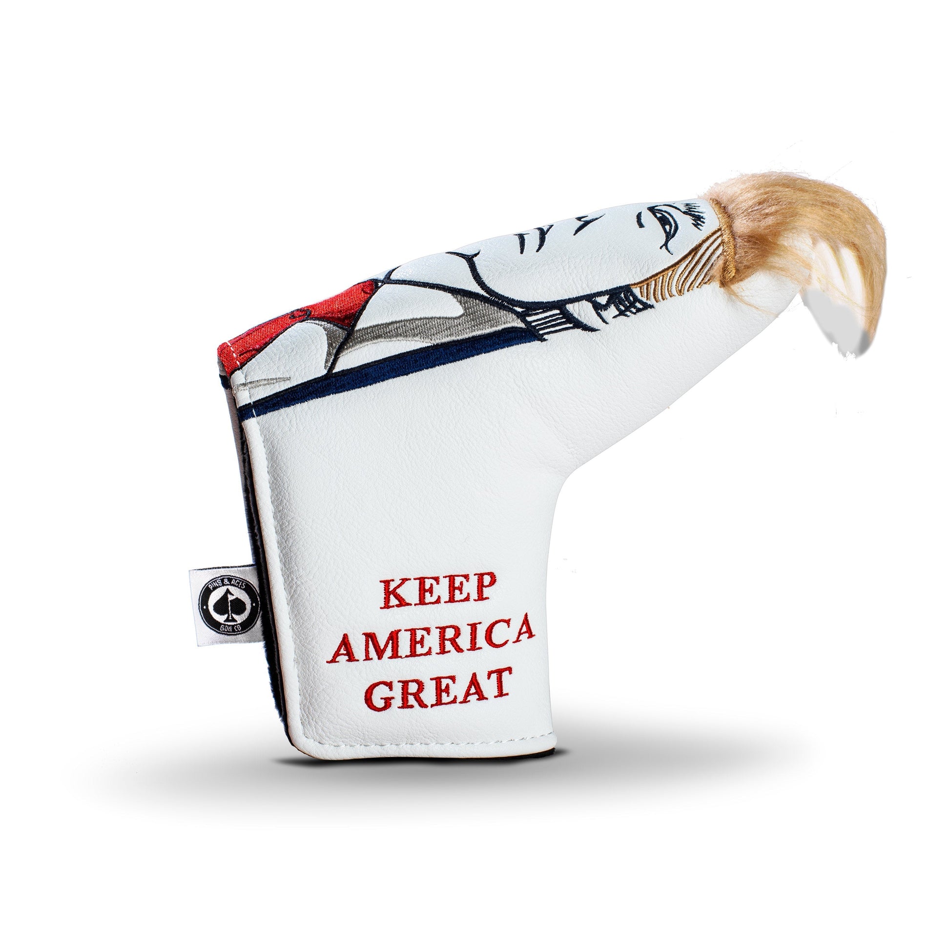 Bold Trump-themed blade putter cover featuring a caricature design and the phrase "KEEP AMERICA GREAT." Perfect for standout golfers.