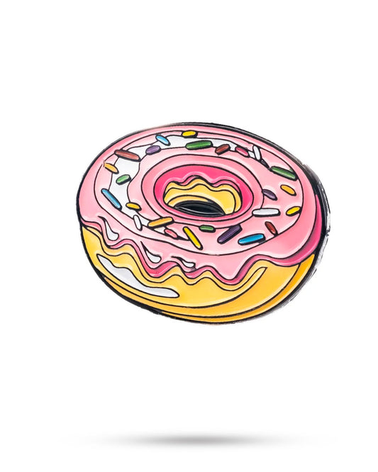 Alt text: "Donut-shaped ball marker featuring a colorful frosting design, perfect for golfers."