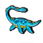 Nessie Ball Marker featuring a whimsical Loch Ness monster design in vibrant colors.