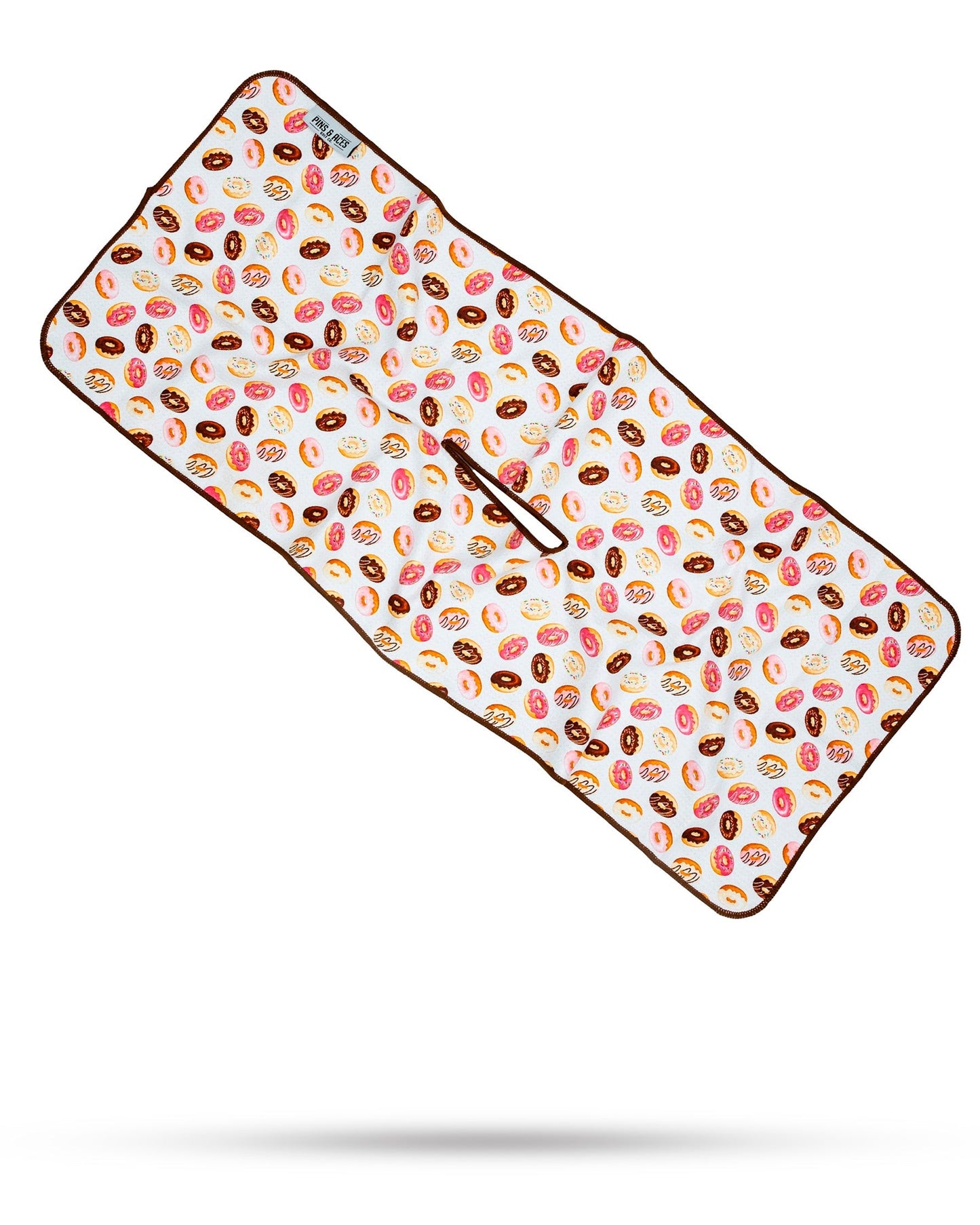 Colorful donut-shaped towel with sprinkles, featured on a white background.