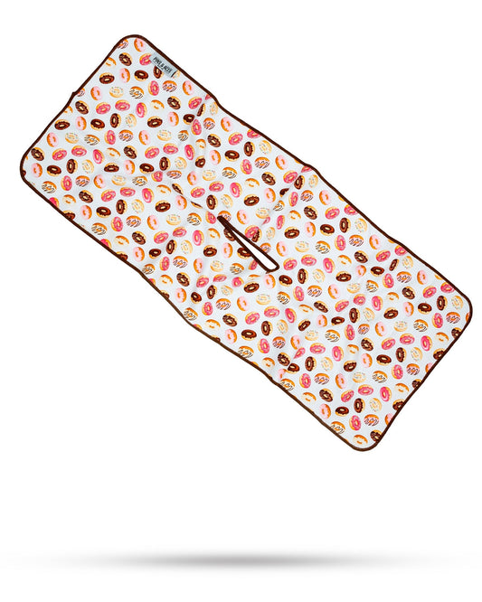 Colorful donut-shaped towel with sprinkles, featured on a white background.