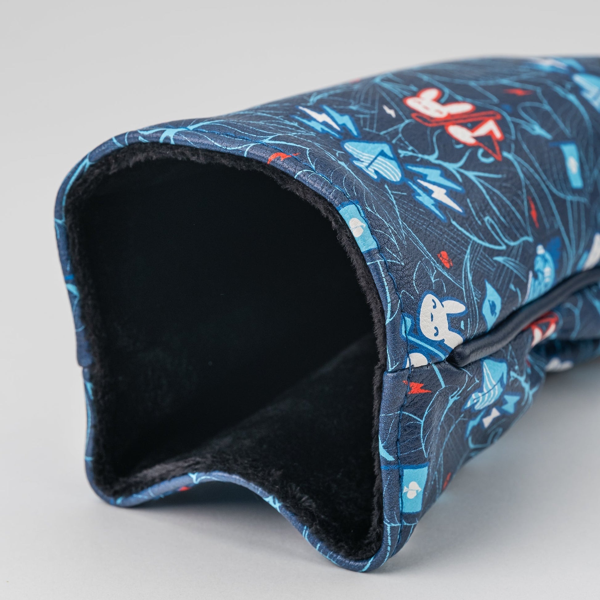 Good Bunny X Fundación Rimas driver cover featuring a vibrant design with playful graphics and bold colors.