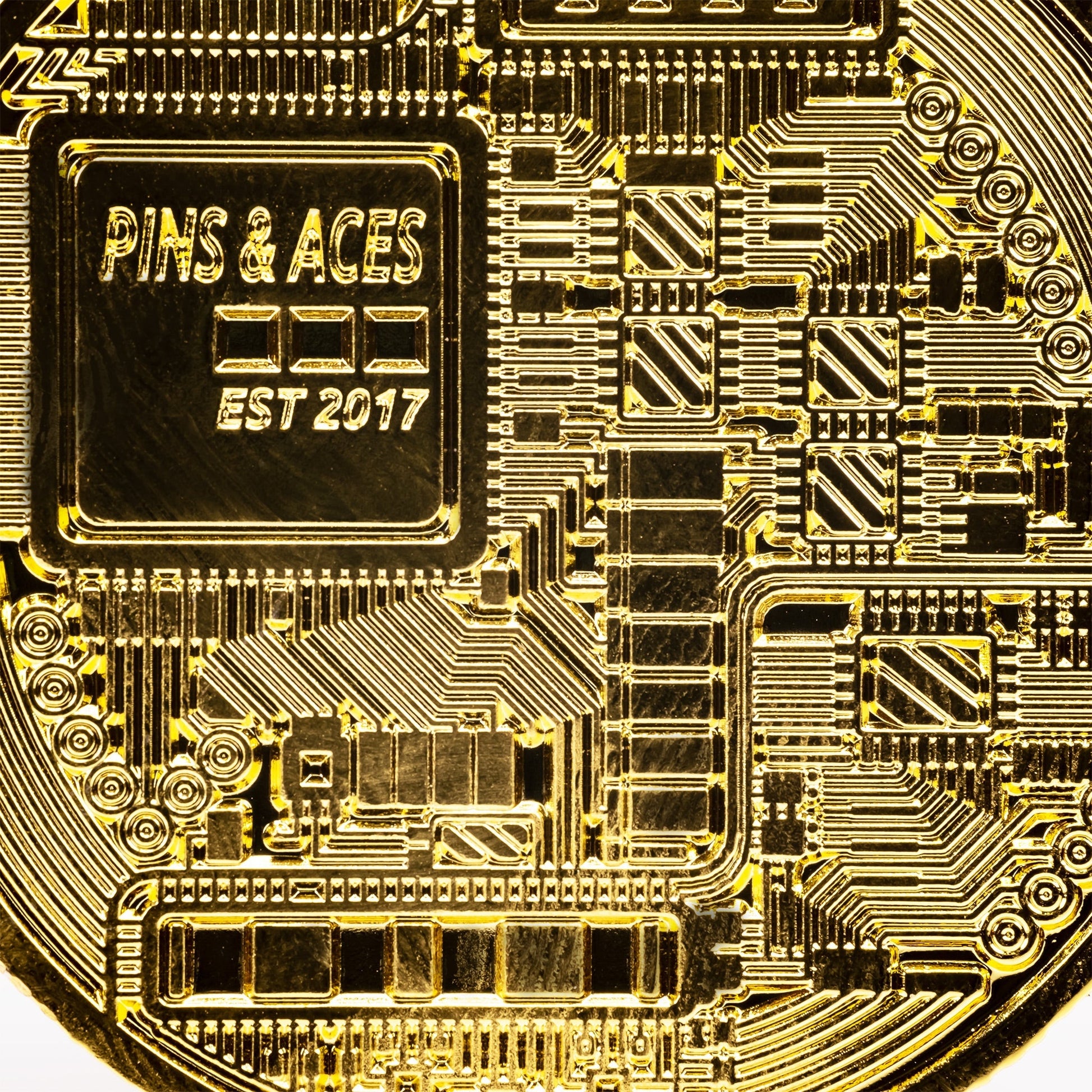 Bitcoin ball marker featuring a detailed design, showcasing the cryptocurrency symbol on a metallic surface.