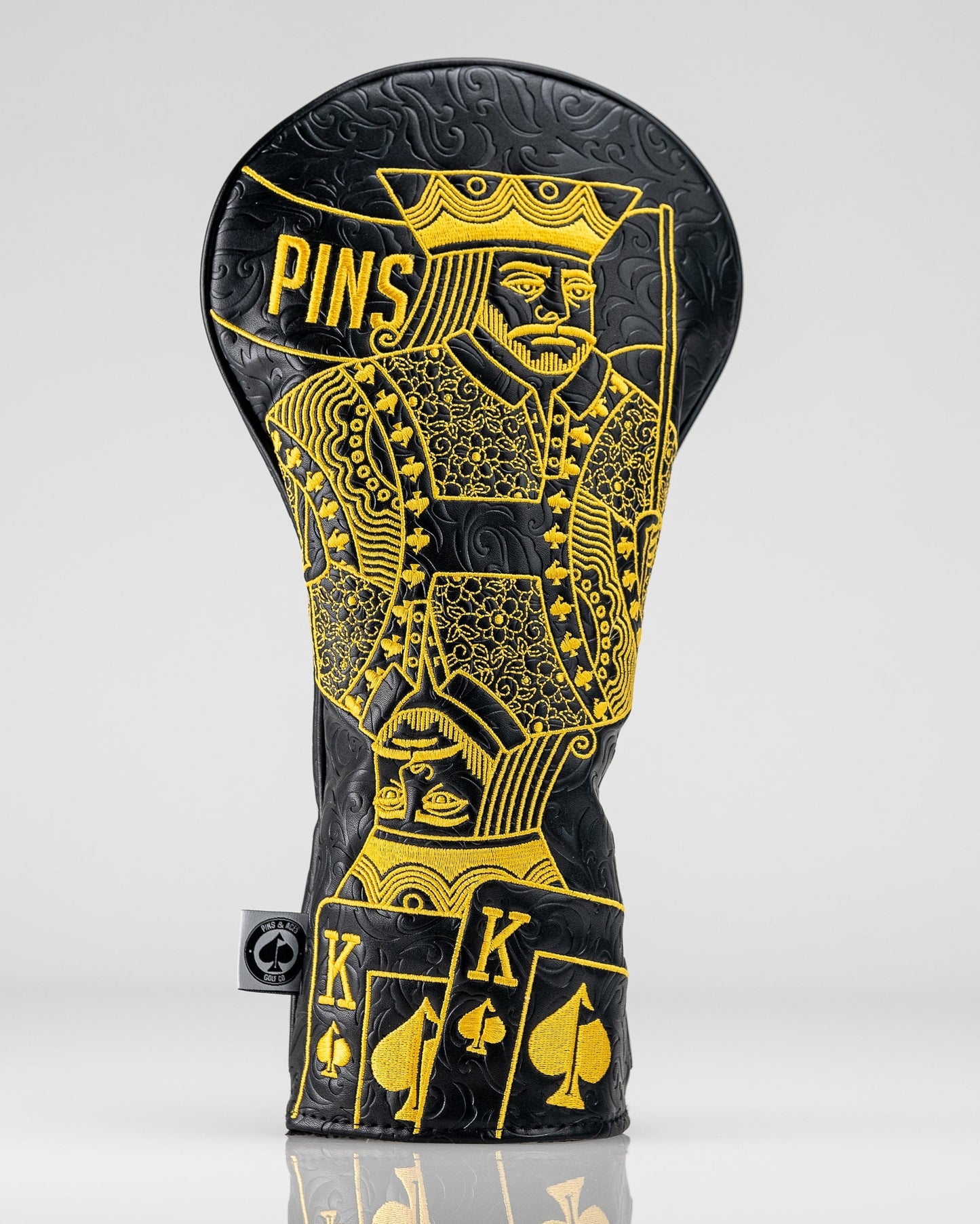 Black and gold King of Spades golf driver cover featuring a sleek design and premium materials.