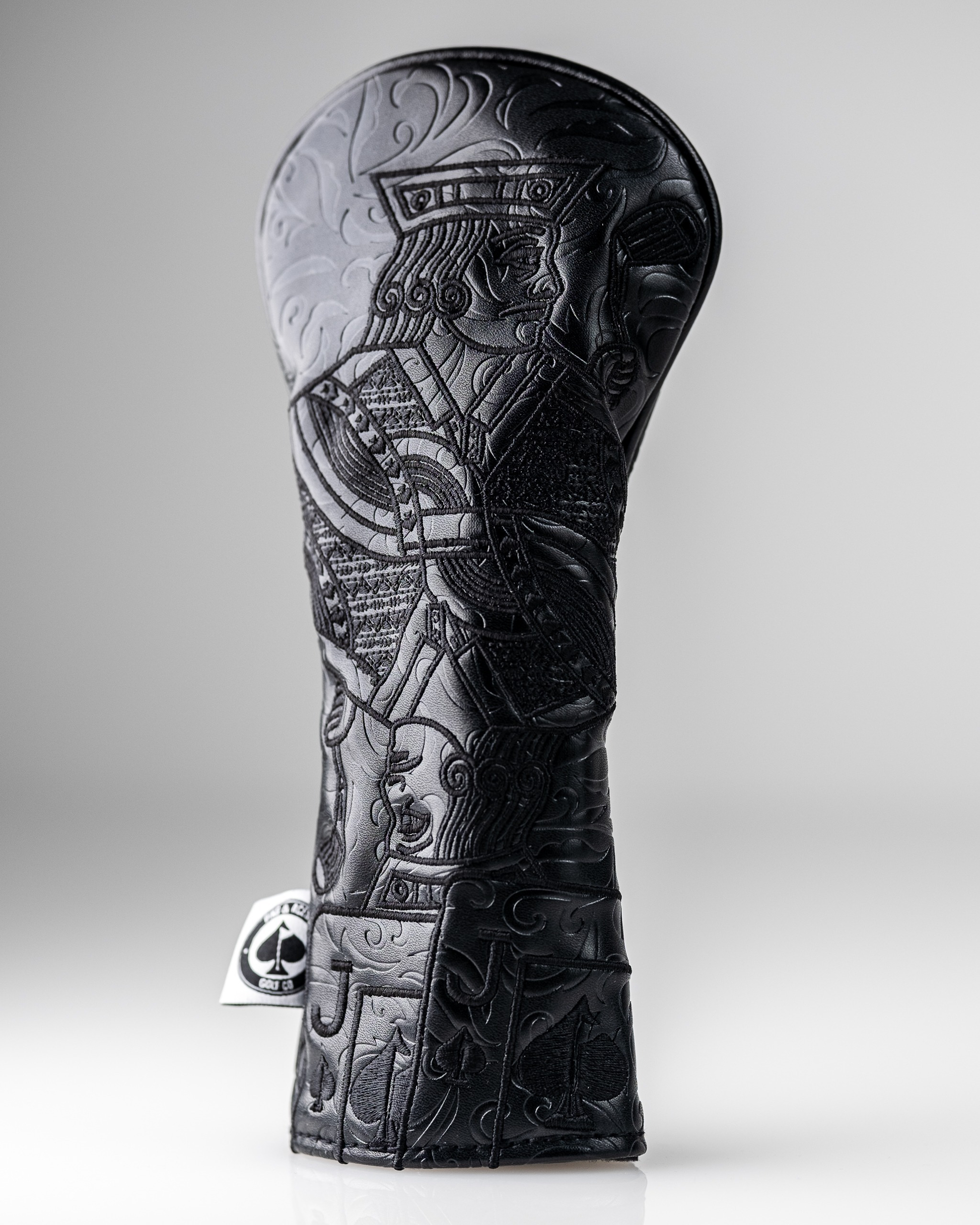 Blackout Jack of Spades hybrid cover featuring intricate embossed design, ideal for golf club protection.