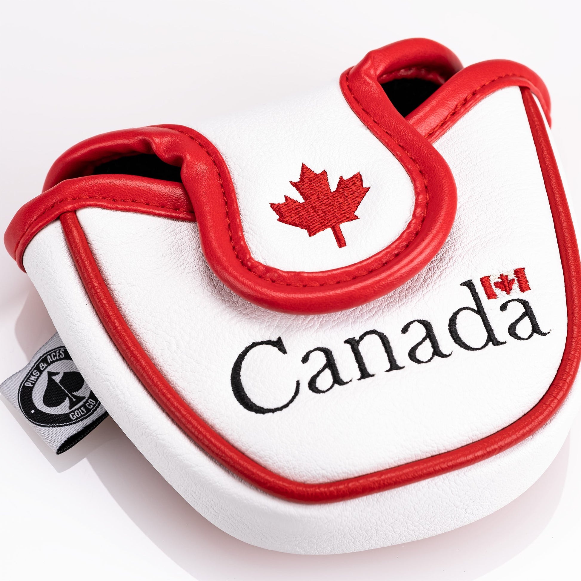 Canada mallet putter cover featuring red and white colors with a maple leaf design.