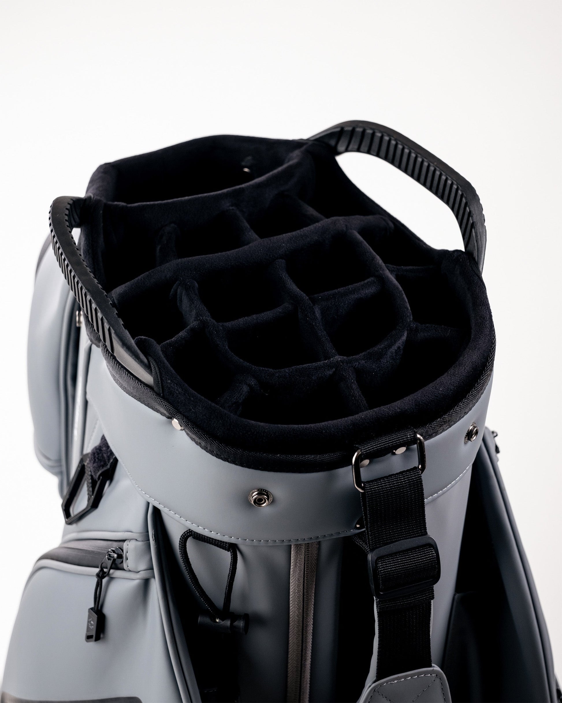 Player Preferred™ Cart Bag in Flat Ash color, featuring multiple pockets and a padded strap for convenient storage and transport.