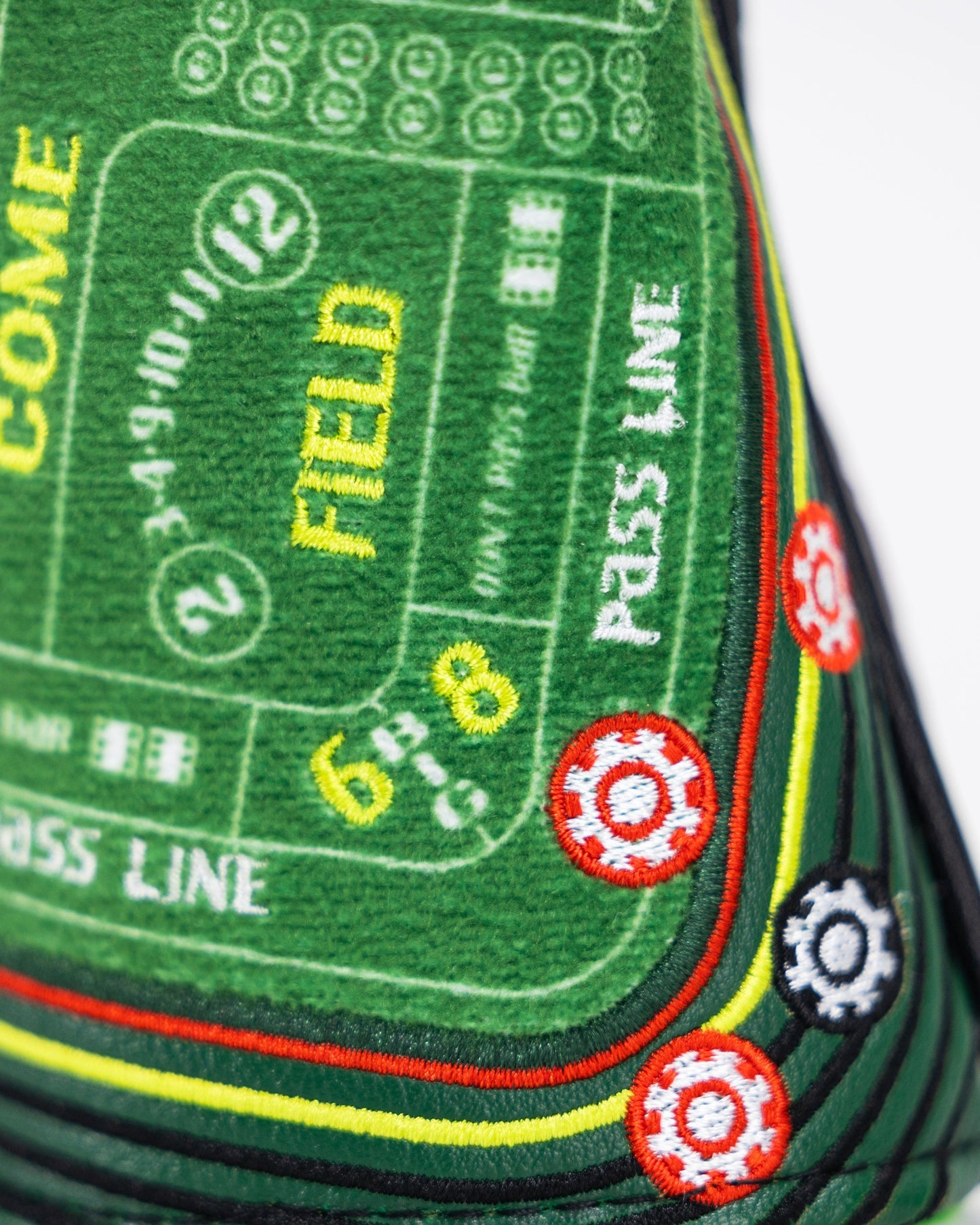 Hybrid golf club headcover featuring a craps casino theme with dice and card designs.