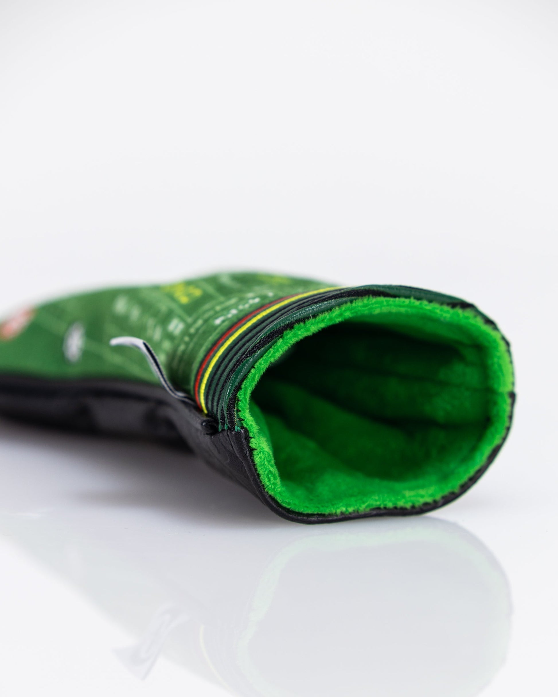 Craps hybrid golf club headcover with casino-themed design featuring a vibrant green background and dice motifs.