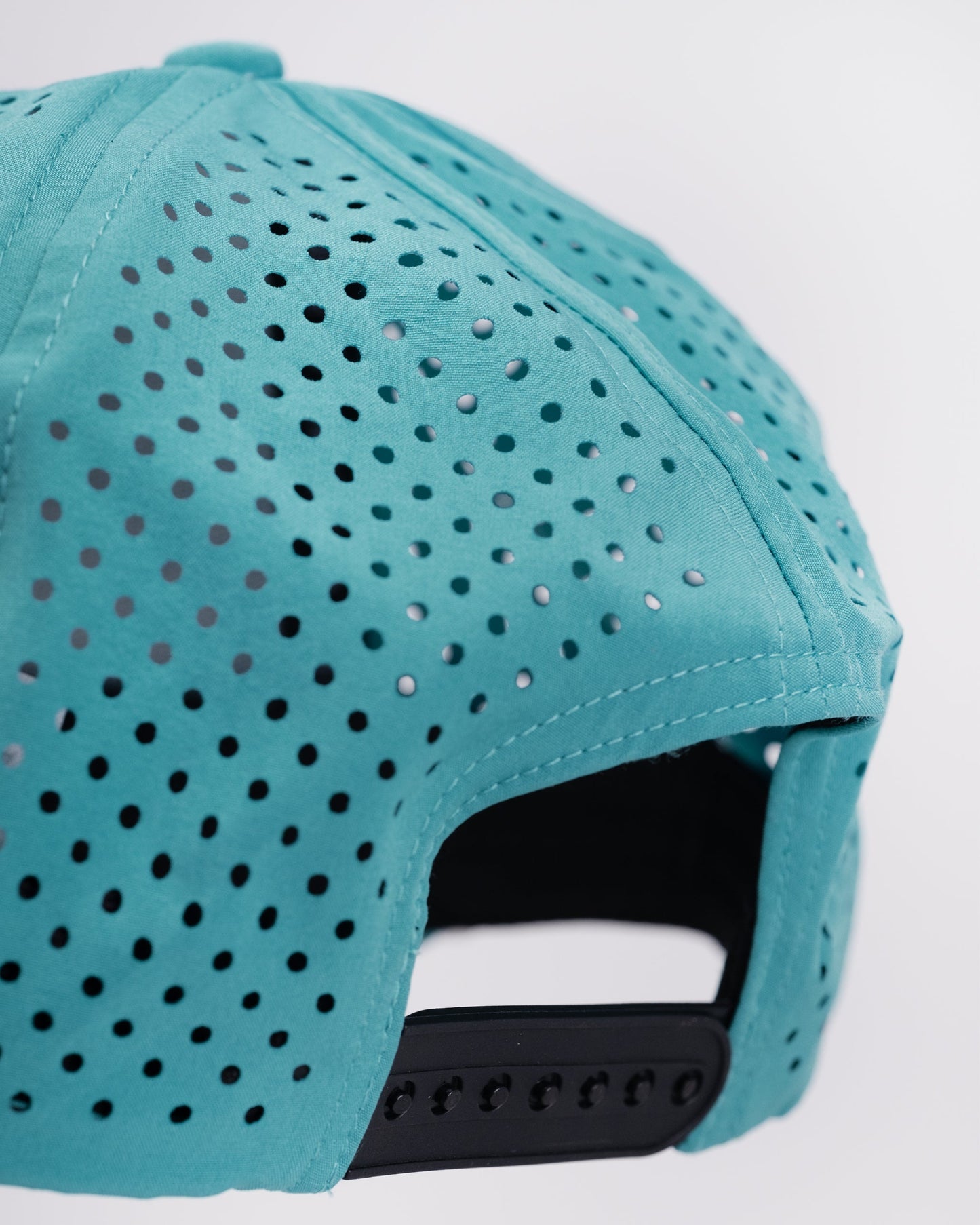 Perforated baby blue rope hat featuring 'Beaver Liquor' logo on the front.