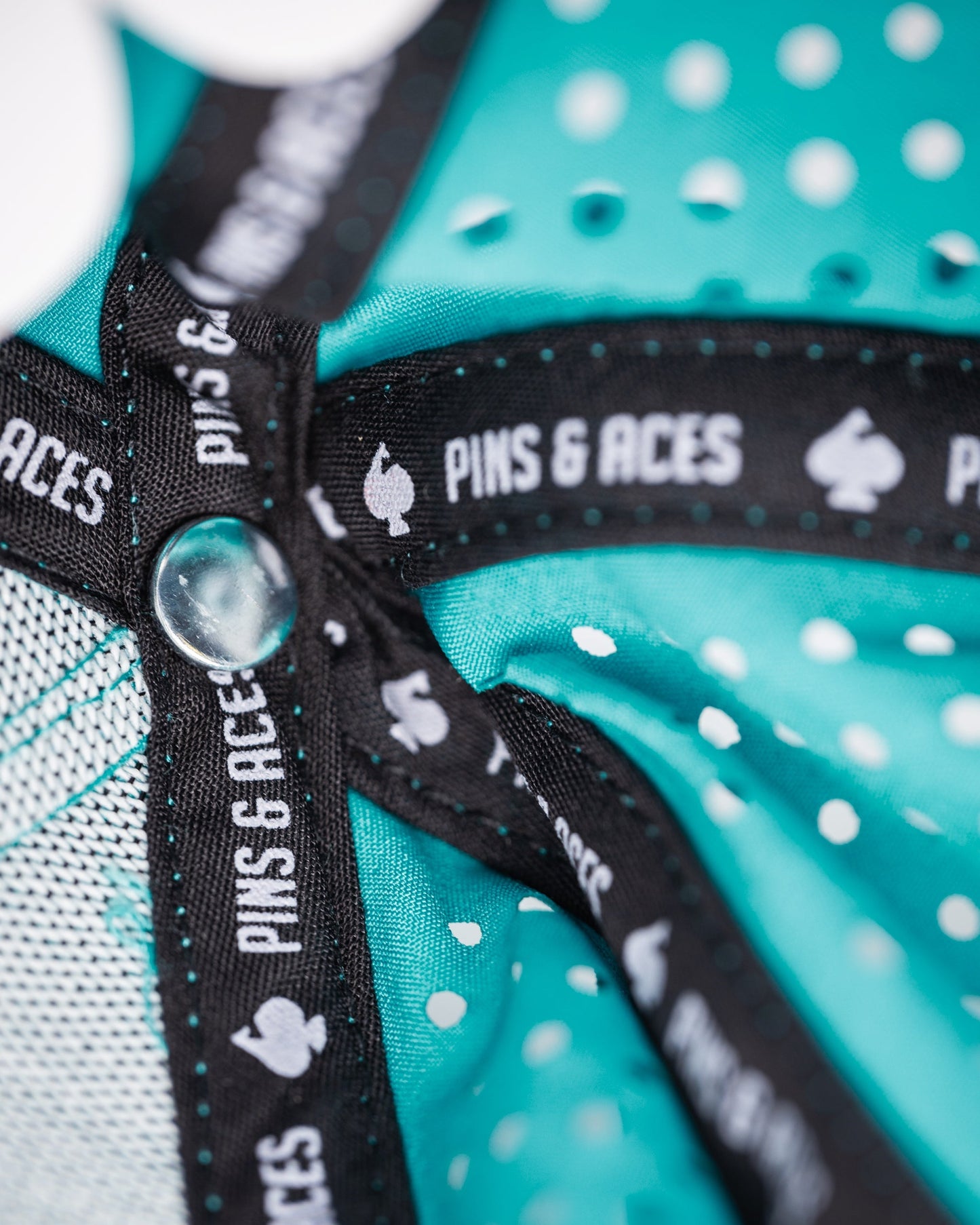 Perforated baby blue rope hat from Parlay, featuring a stylish woven design and adjustable strap.