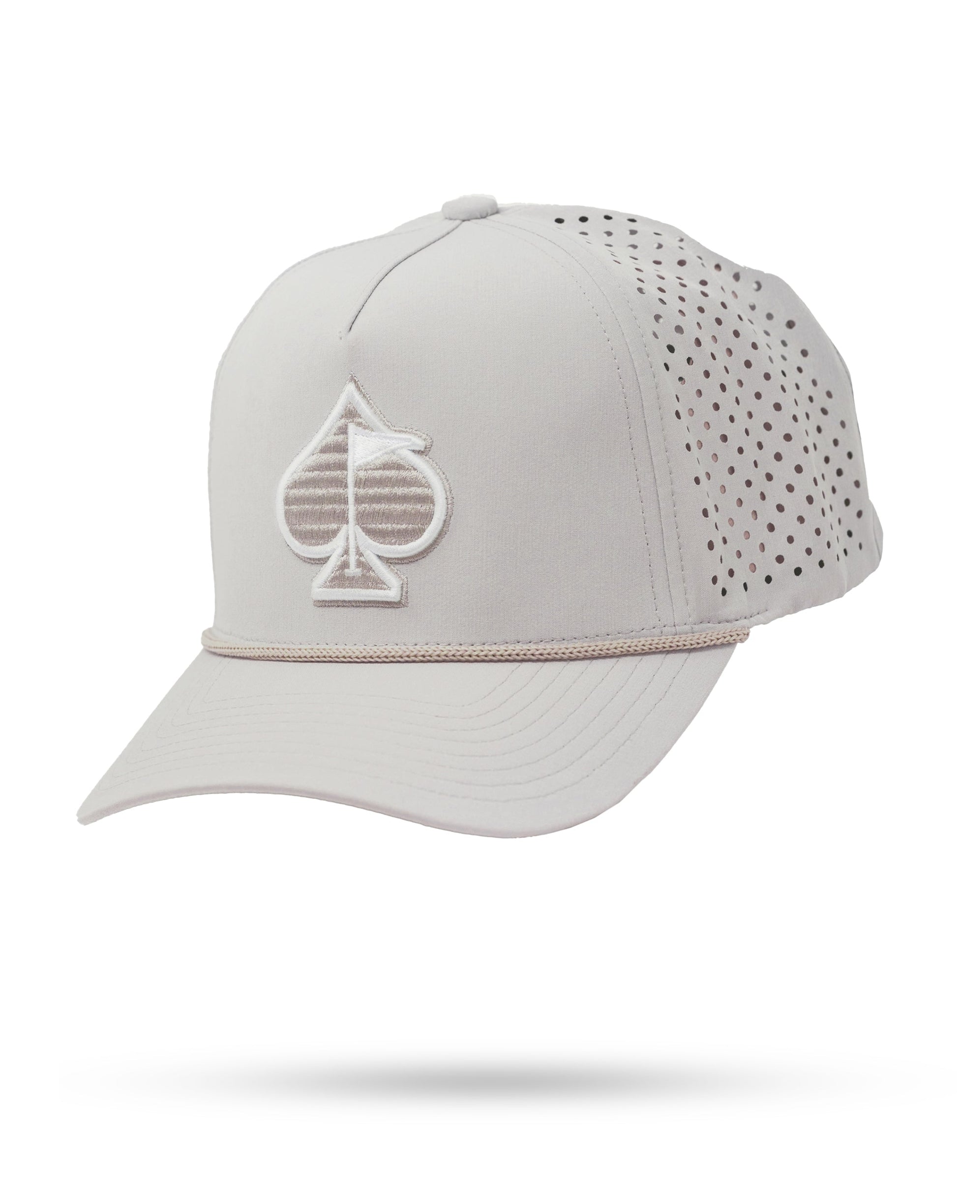 Perforated rope hat in bone color with a stylish design and adjustable strap.