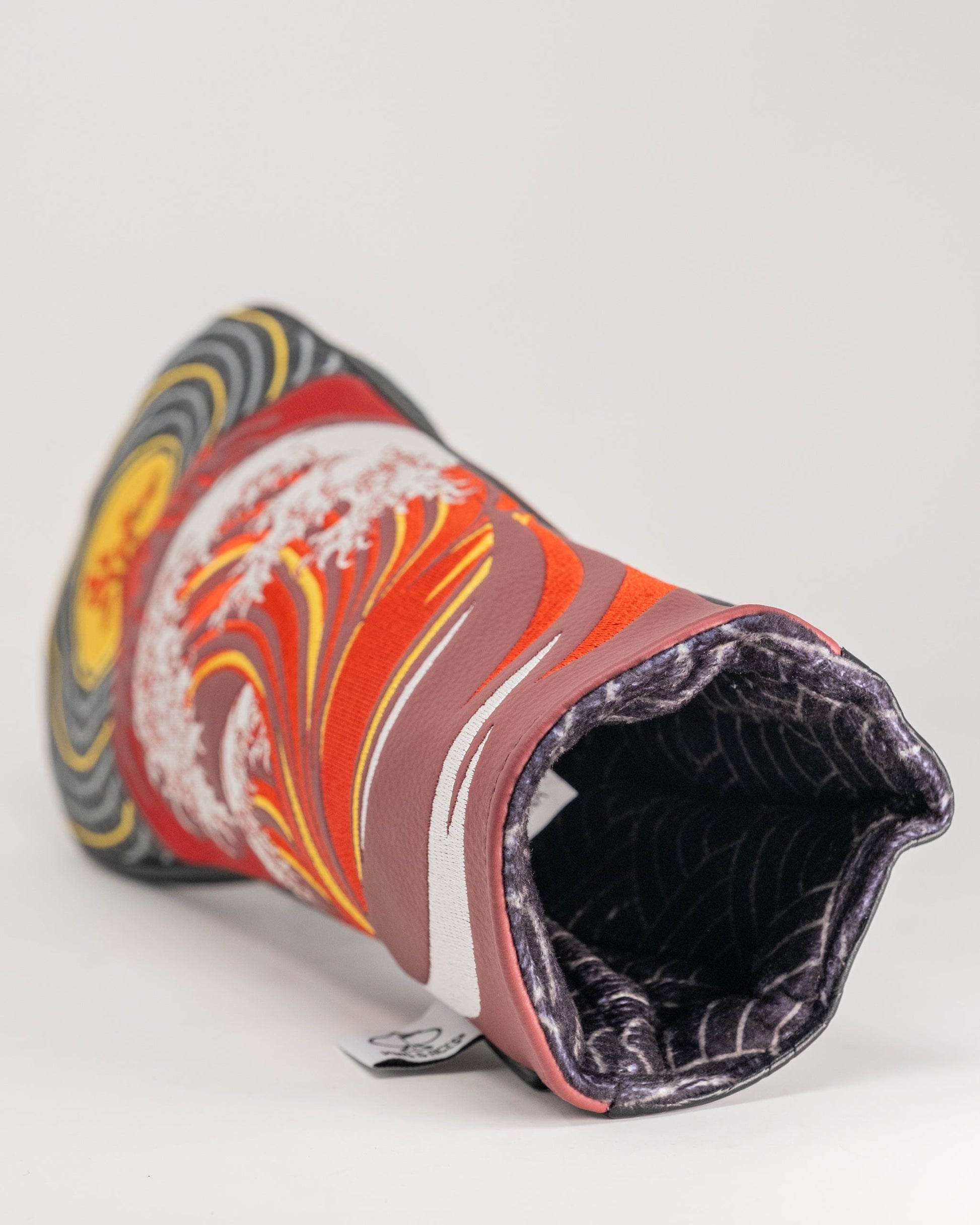 Fire & Fury Fairway Cover featuring vibrant flames and wave designs, perfect for golf enthusiasts seeking a bold accessory.