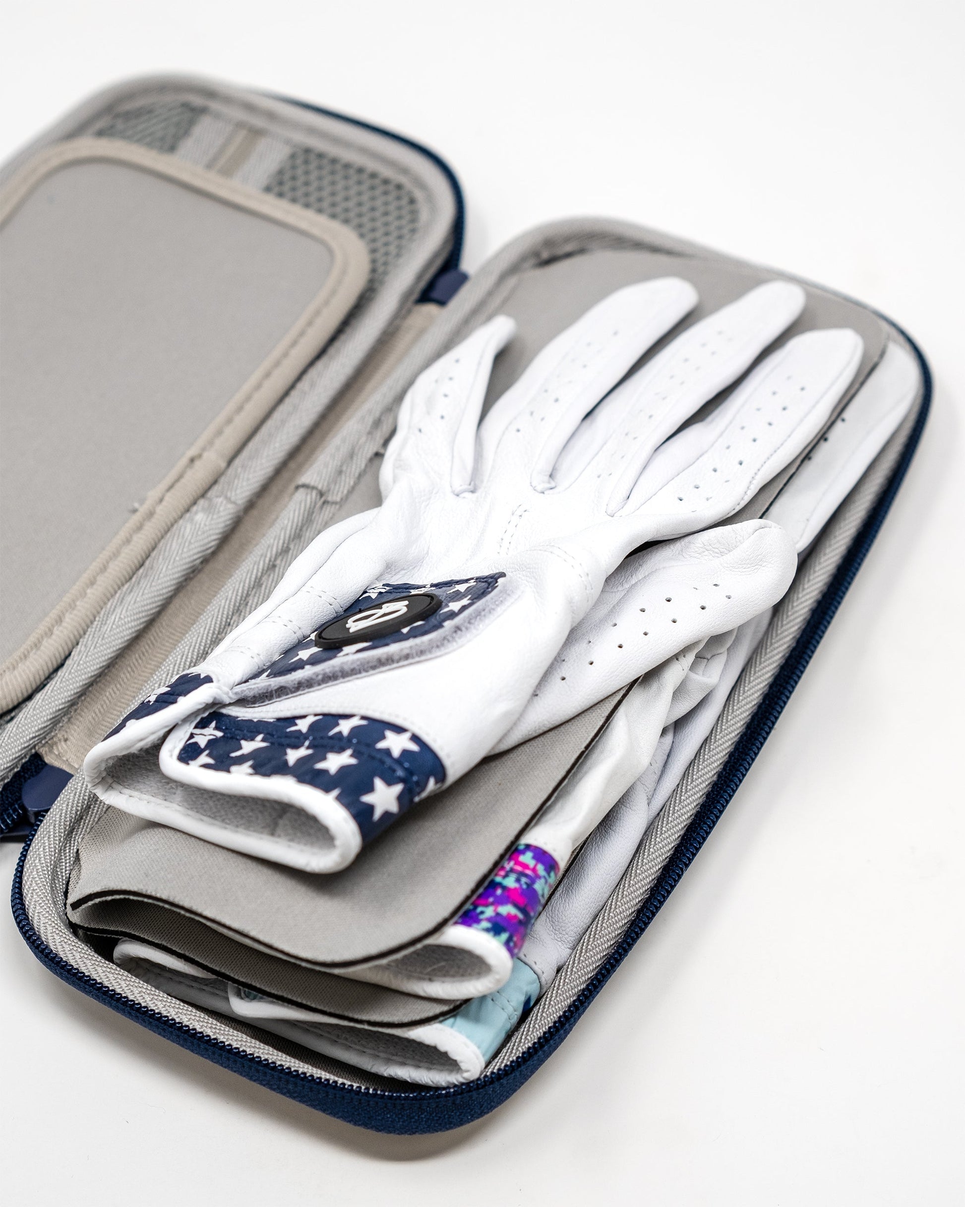Black glove and accessory caddie designed for organization and easy access.