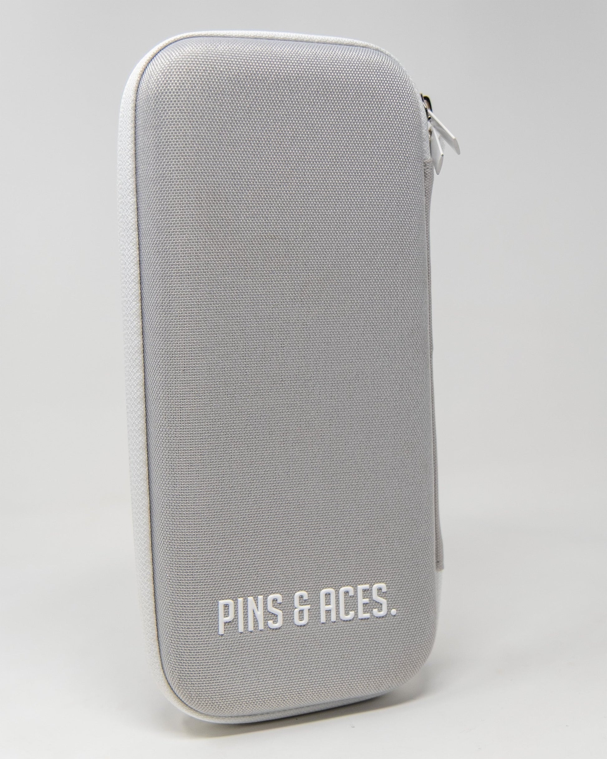 Gray glove and accessory caddie with a sleek design and zipper closure, featuring the Pins and Aces logo.