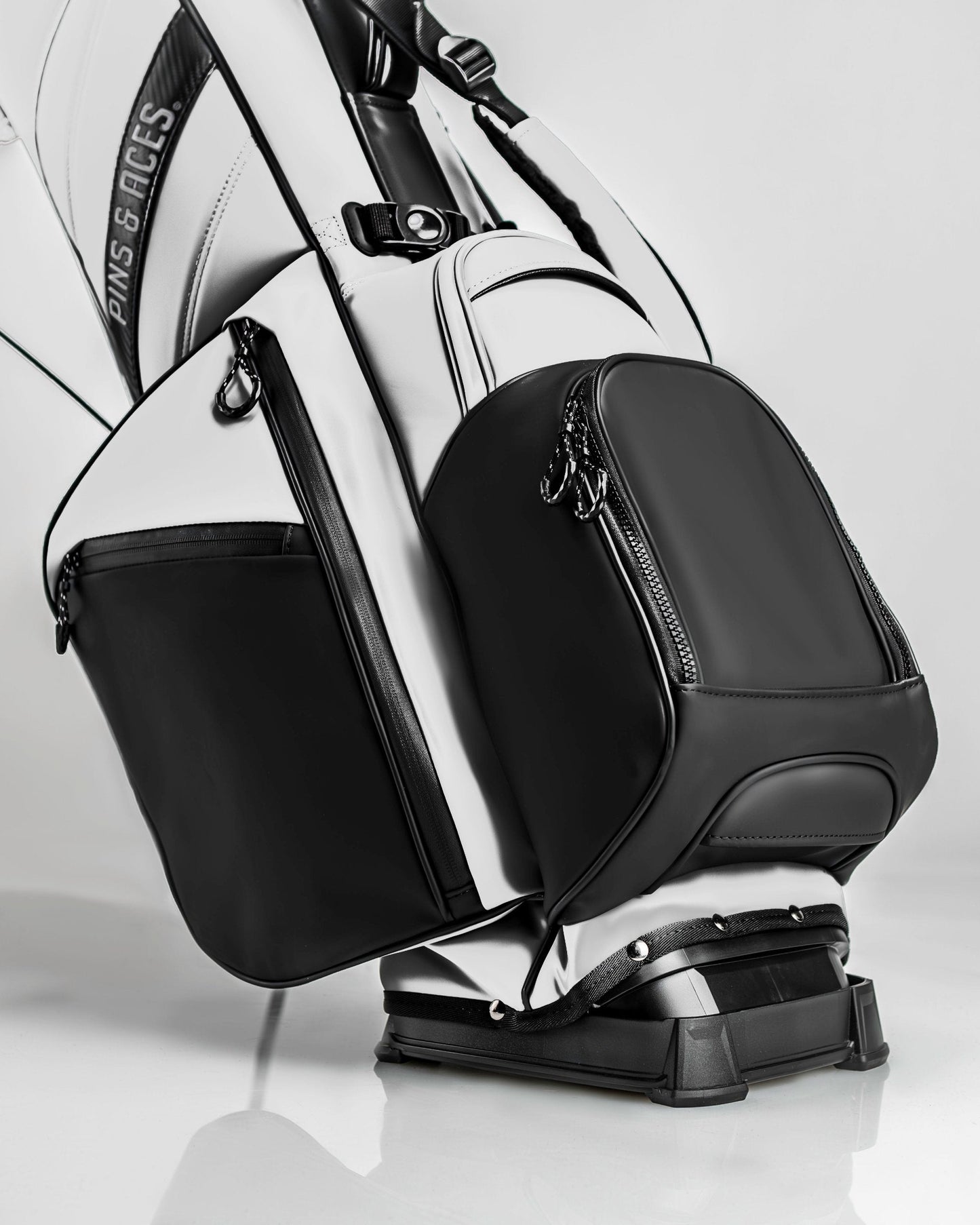 Player Preferred™ Golf Bag in Domino pattern with a stay-flat bottom and multiple pockets for convenience.