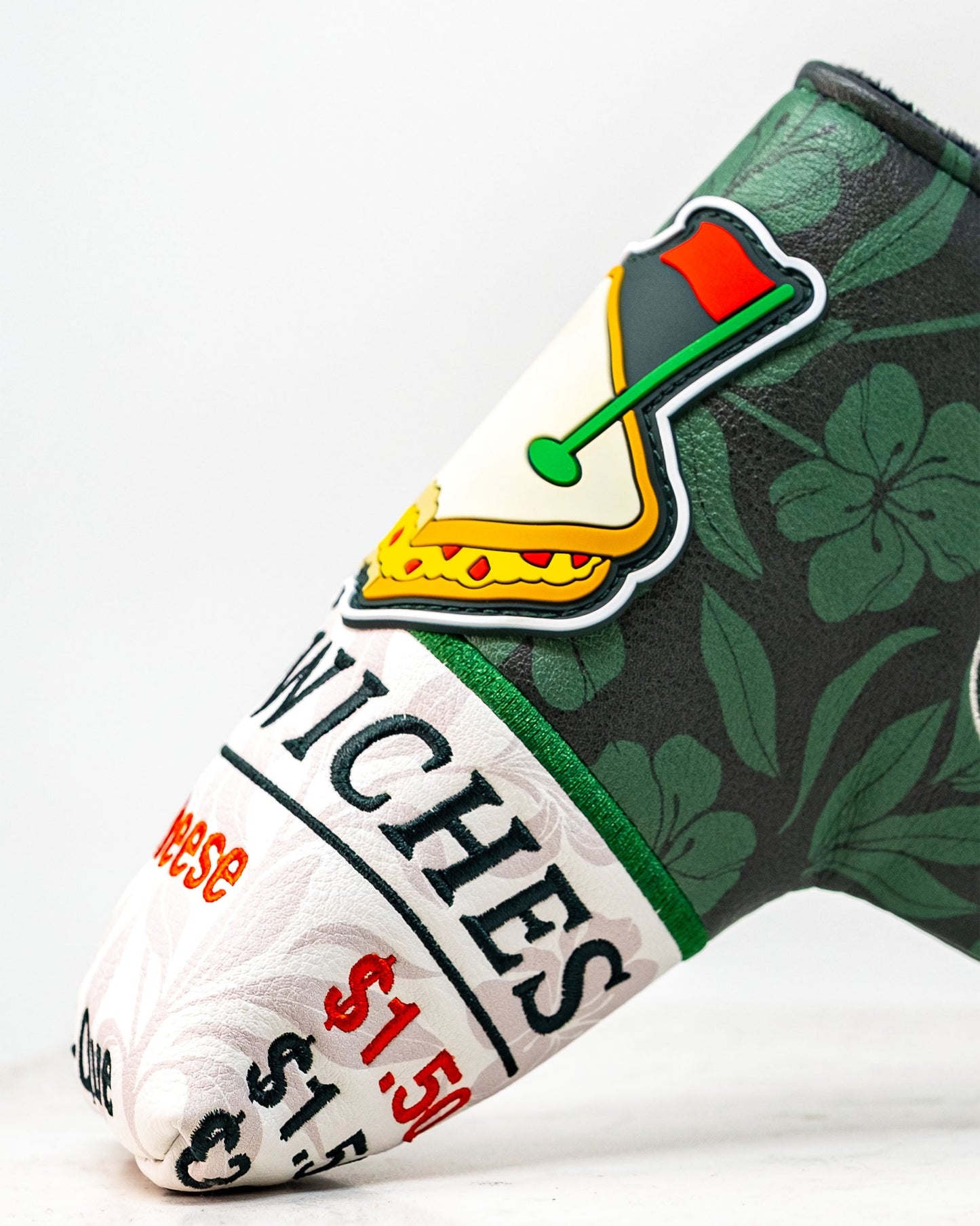 Augusta '25 Blade Putter Cover in green and white with a classic design and logo detail.