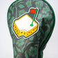 Augusta '25 Driver Cover featuring a sleek design in vibrant colors, showcasing the Augusta National logo on a high-quality fabric.