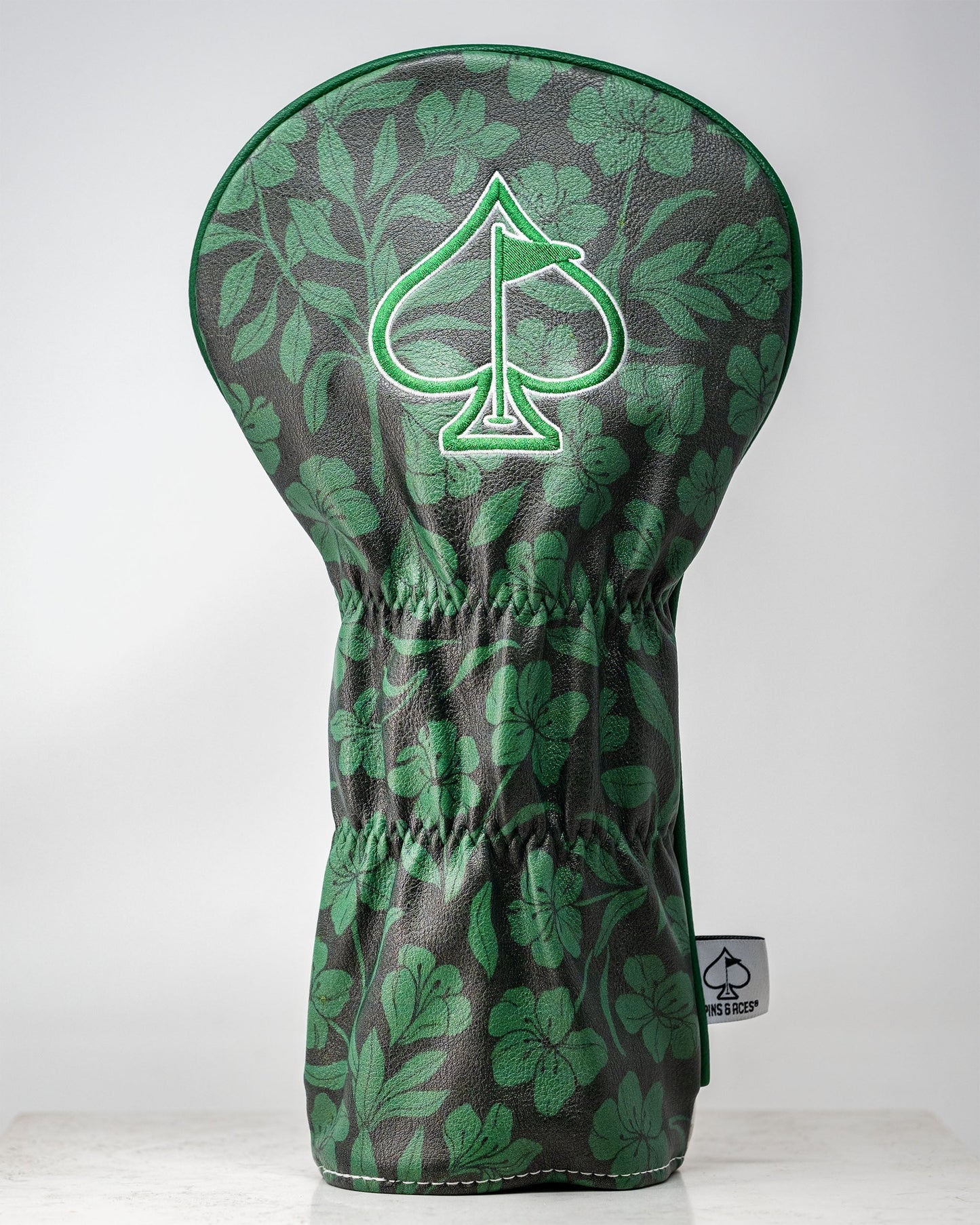 Augusta '25 Driver Cover featuring a vibrant green design with a classic pattern, ideal for golf enthusiasts.