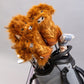 Highland Cow driver cover set with plush, furry cow faces and patterned socks, placed in a golf bag for protection.