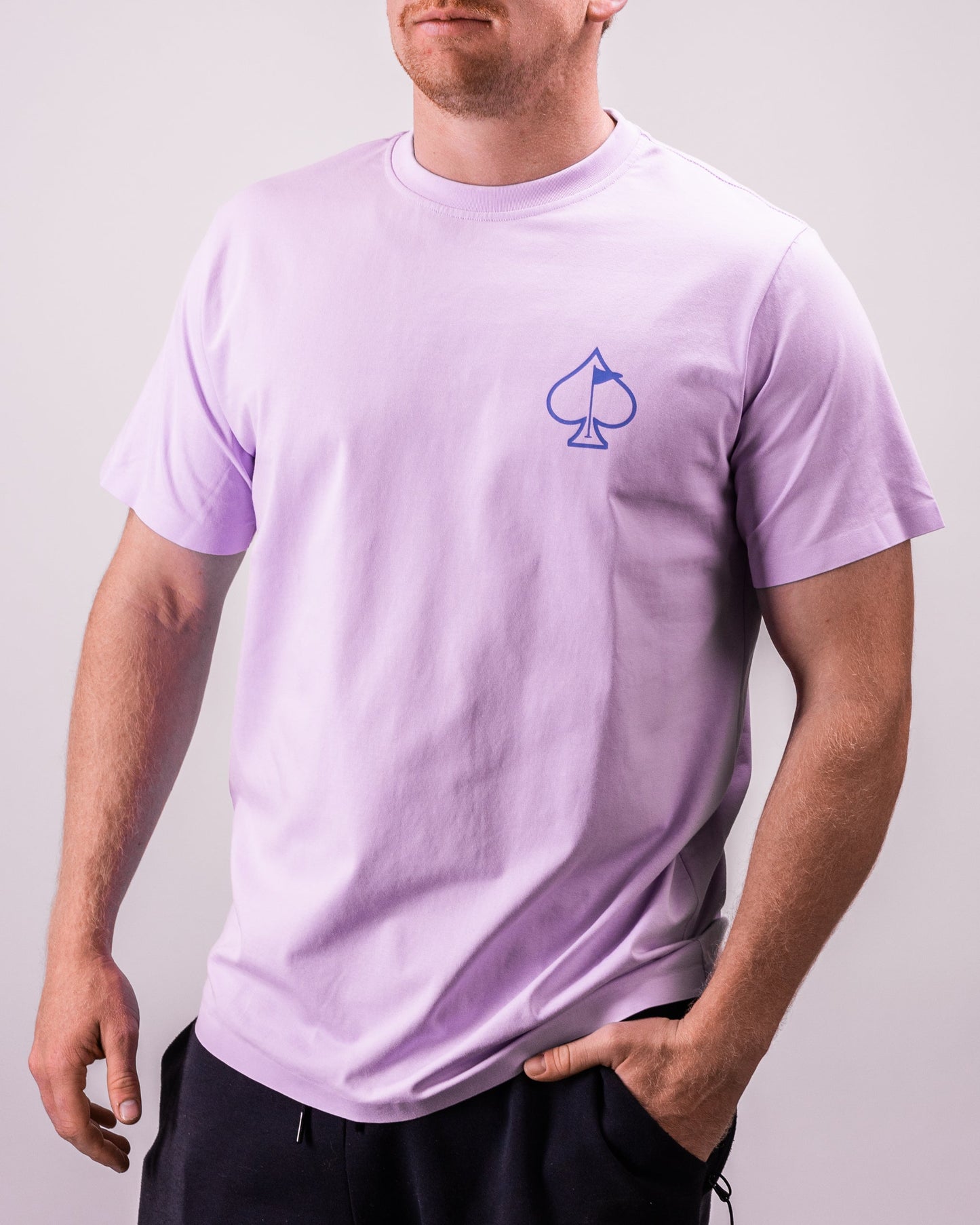 Casual black tee featuring the "Streamliner" graphic design, displayed on a model in an outdoor setting.