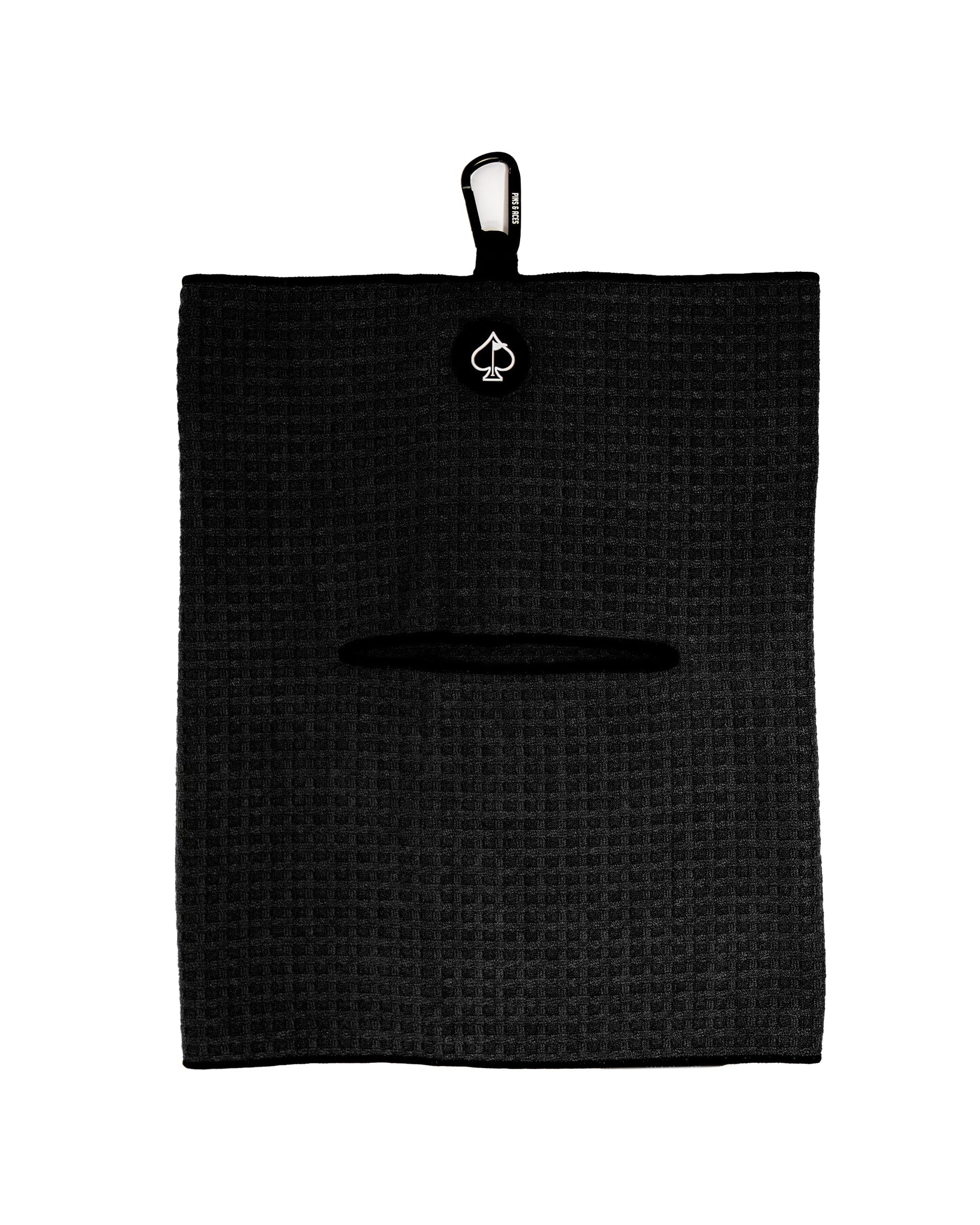 Black magnetic towel with a sleek design, featuring a strong magnetic closure for convenience and functionality.