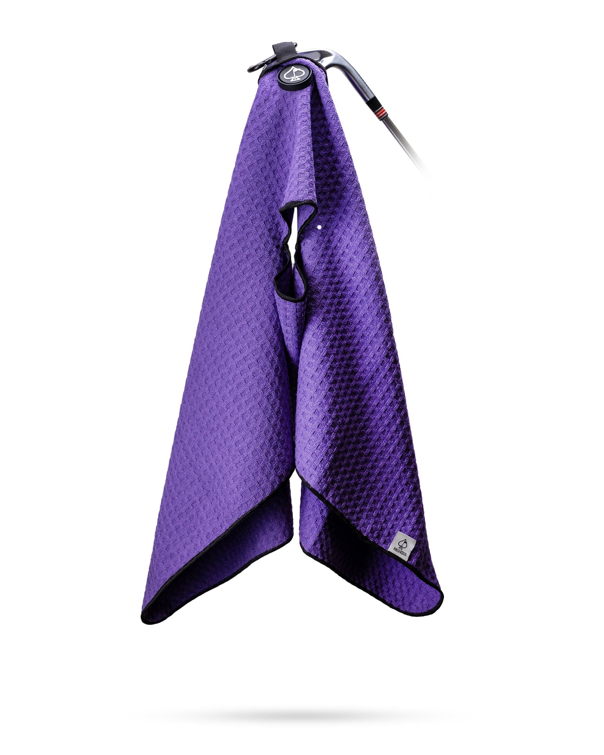 Magnetic towel in grape color, featuring a compact design with a magnet for easy attachment.