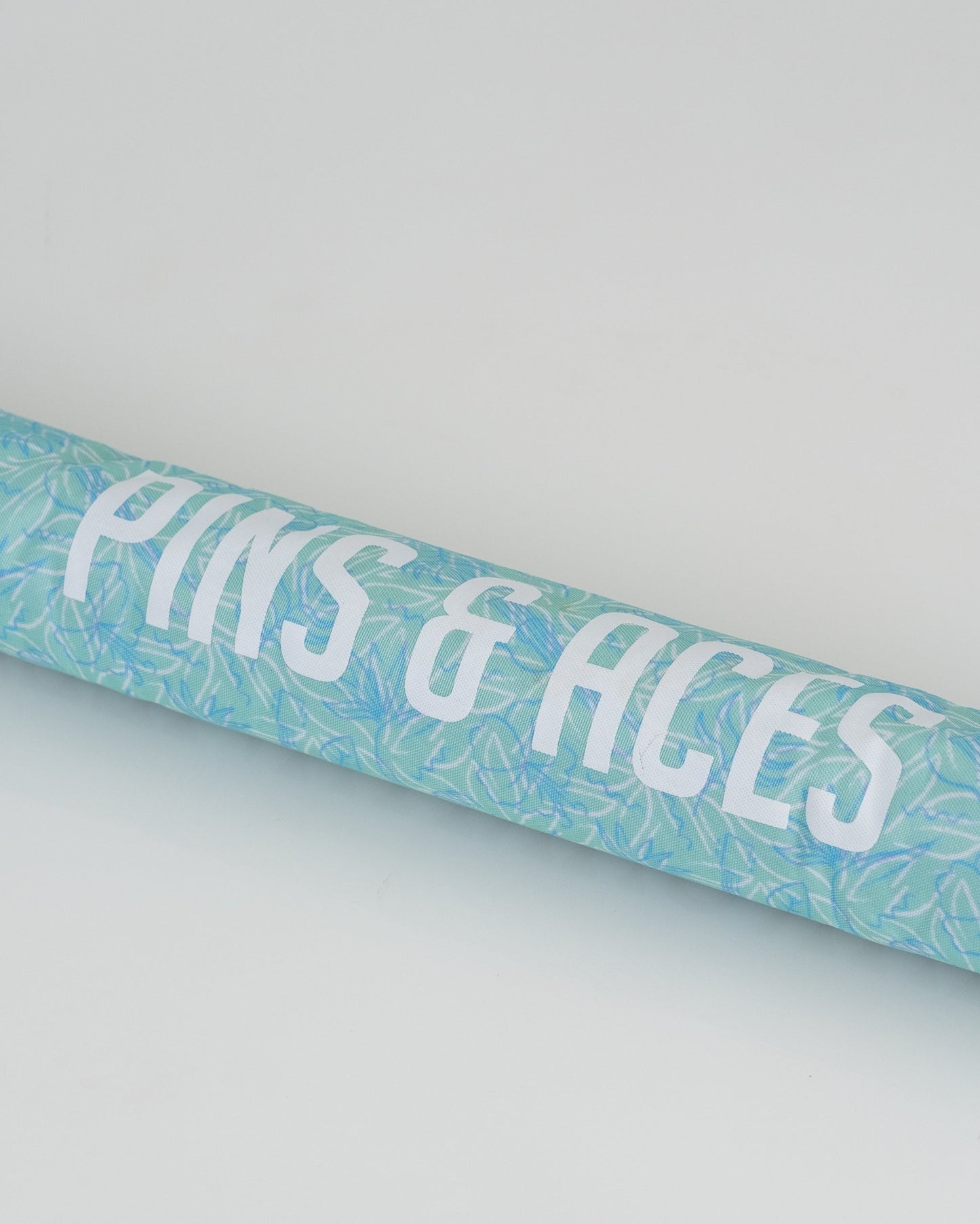 Margaritaville beer sleeve featuring a vibrant tropical design, ideal for keeping beverages cold.