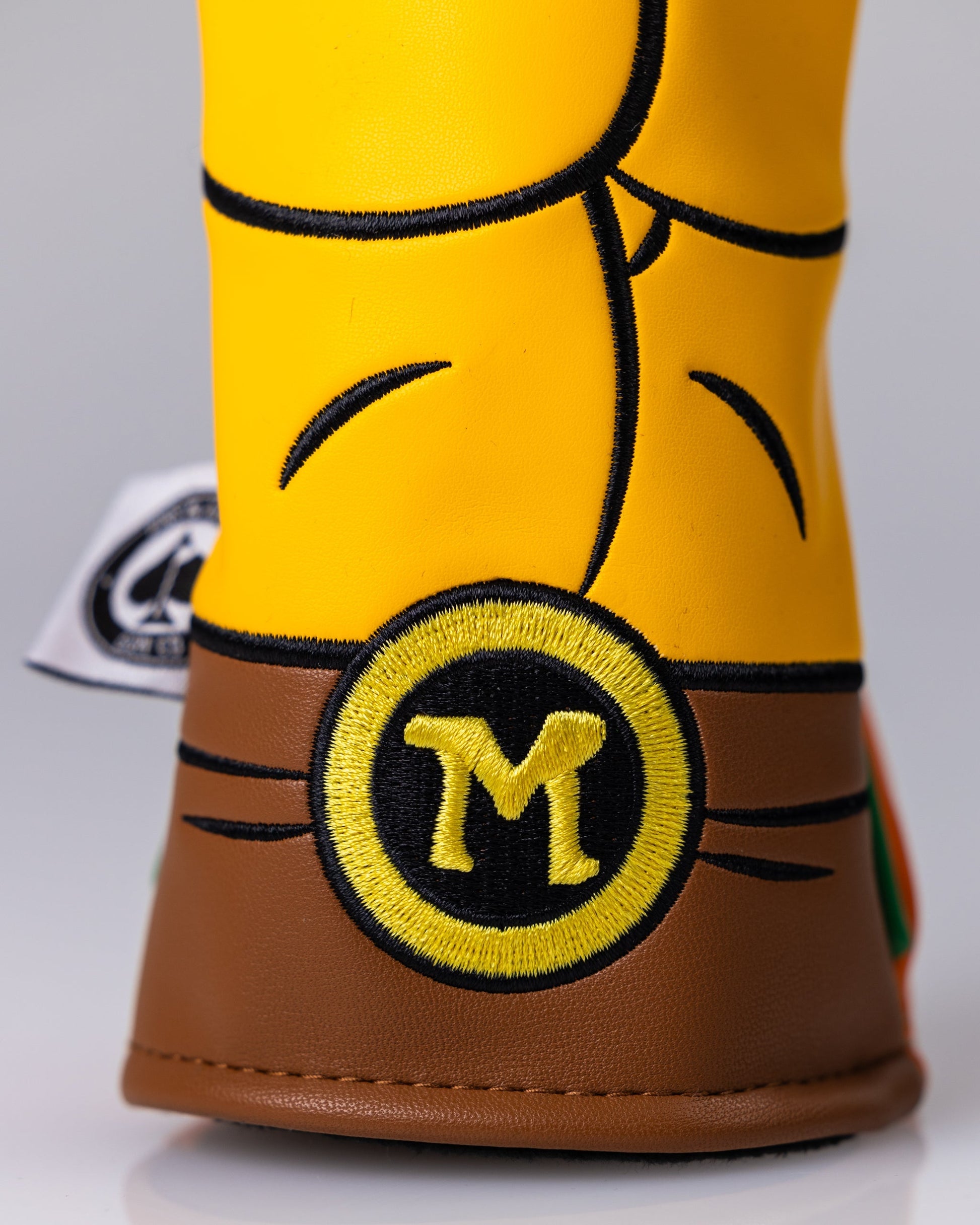 TMNT Michelangelo Hybrid Cover featuring vibrant artwork of Michelangelo in action with his nunchaku, showcasing a dynamic design and colorful graphics.