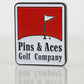 Red ball marker with a circular design, featuring a glossy finish and the brand logo prominently displayed in the center.