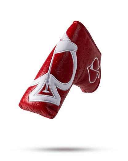 Bold red golf headcover with white logo and embossed pattern, designed to stand out on the course.