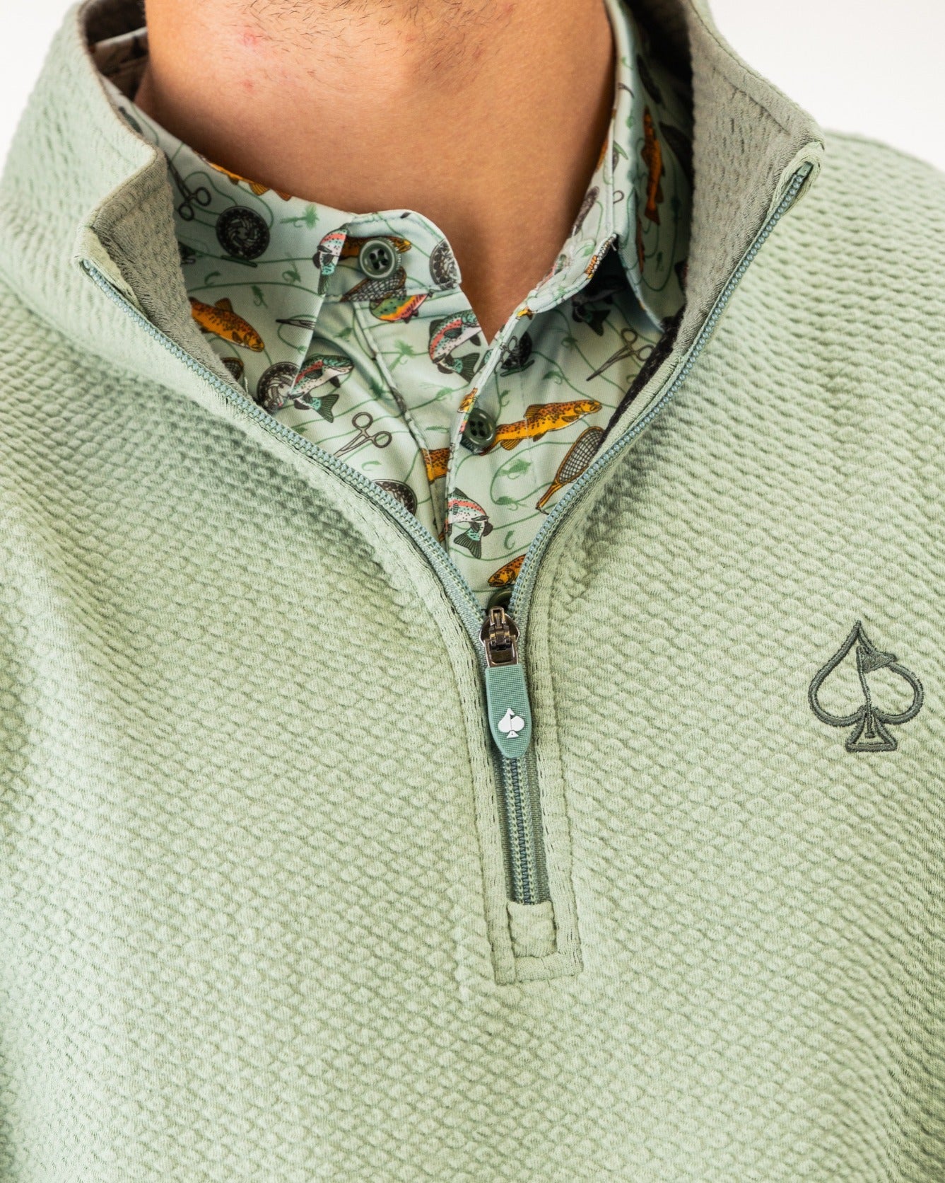 Olive Player Preferred Waffle Knit Pullover featuring a half-zip design and a stylish embroidered logo.