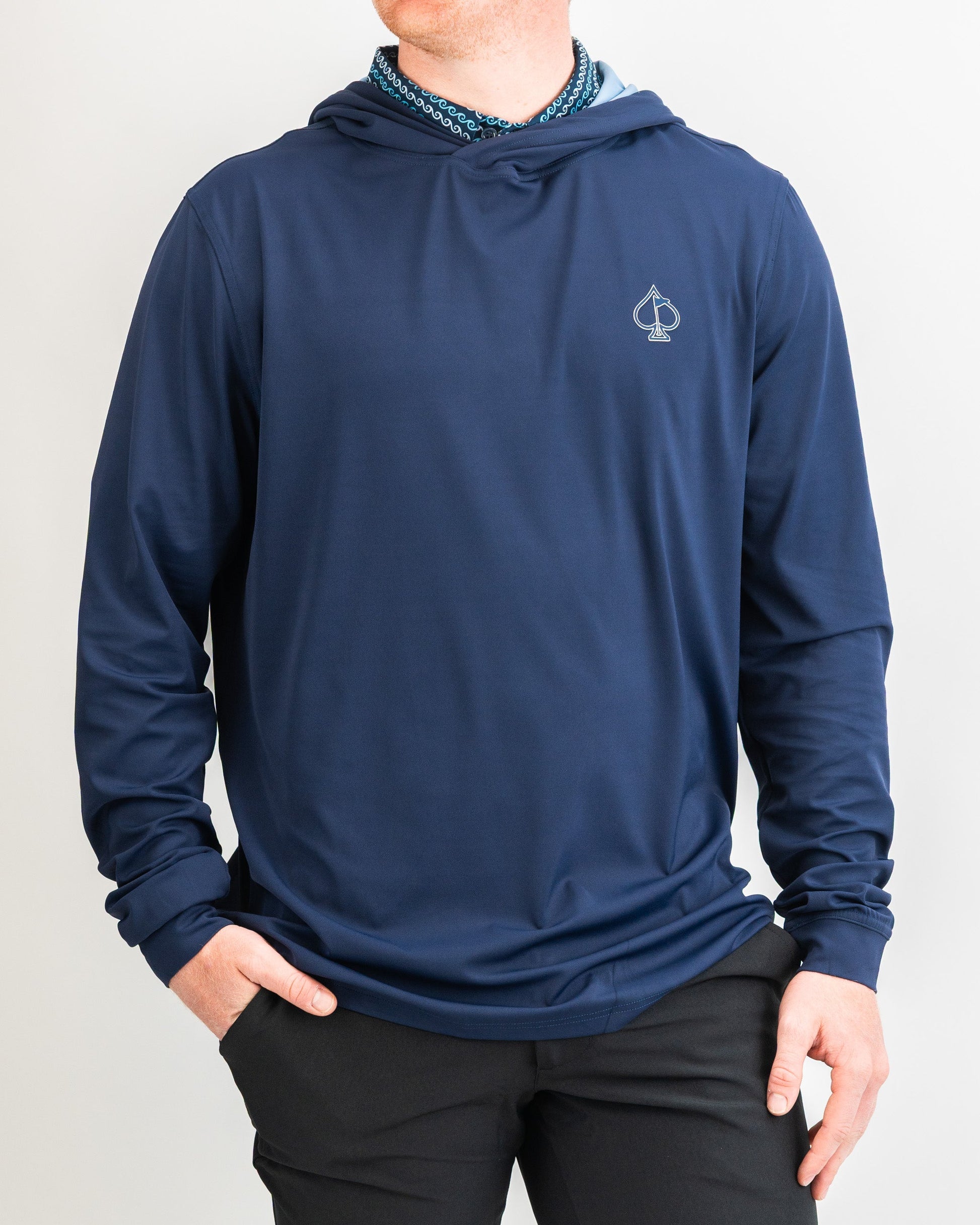 Navy performance golf hoodie featuring a logo, designed for comfort and style on the golf course. Ideal for active wear.