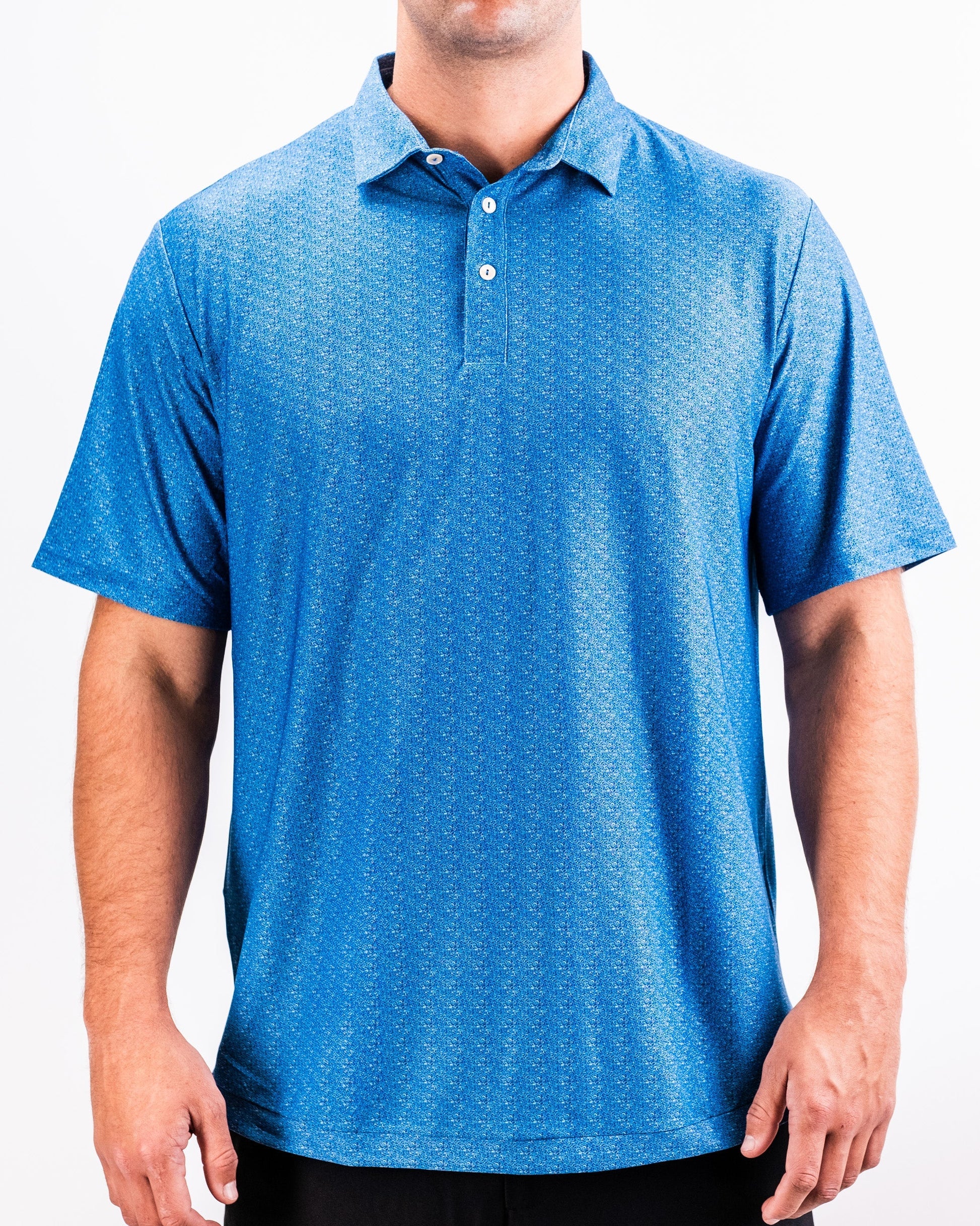 Player Preferred™ Polo in Cosmic Swirl design, featuring a vibrant multicolored swirl pattern on a lightweight fabric.