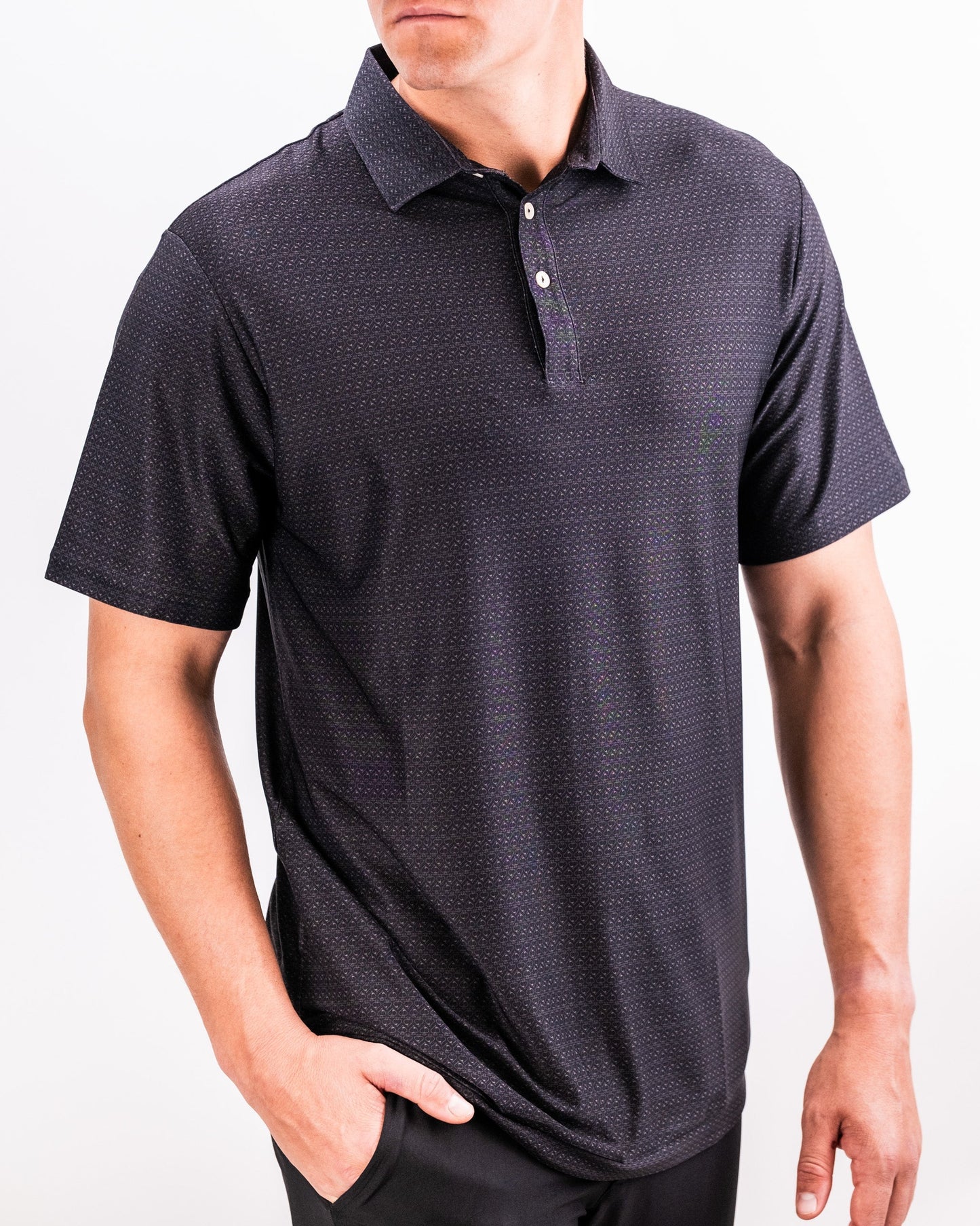 Player Preferred™ Polo in Midnight Spade color, featuring a modern design and relaxed fit, displayed against a neutral background.