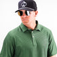 Player Preferred™ Polo in Forest Wave color, featuring a classic collar and short sleeves, displayed on a neutral background.