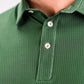 Men's Player Preferred™ Polo in Forest Wave color, featuring a classic design, collared neck, and short sleeves.