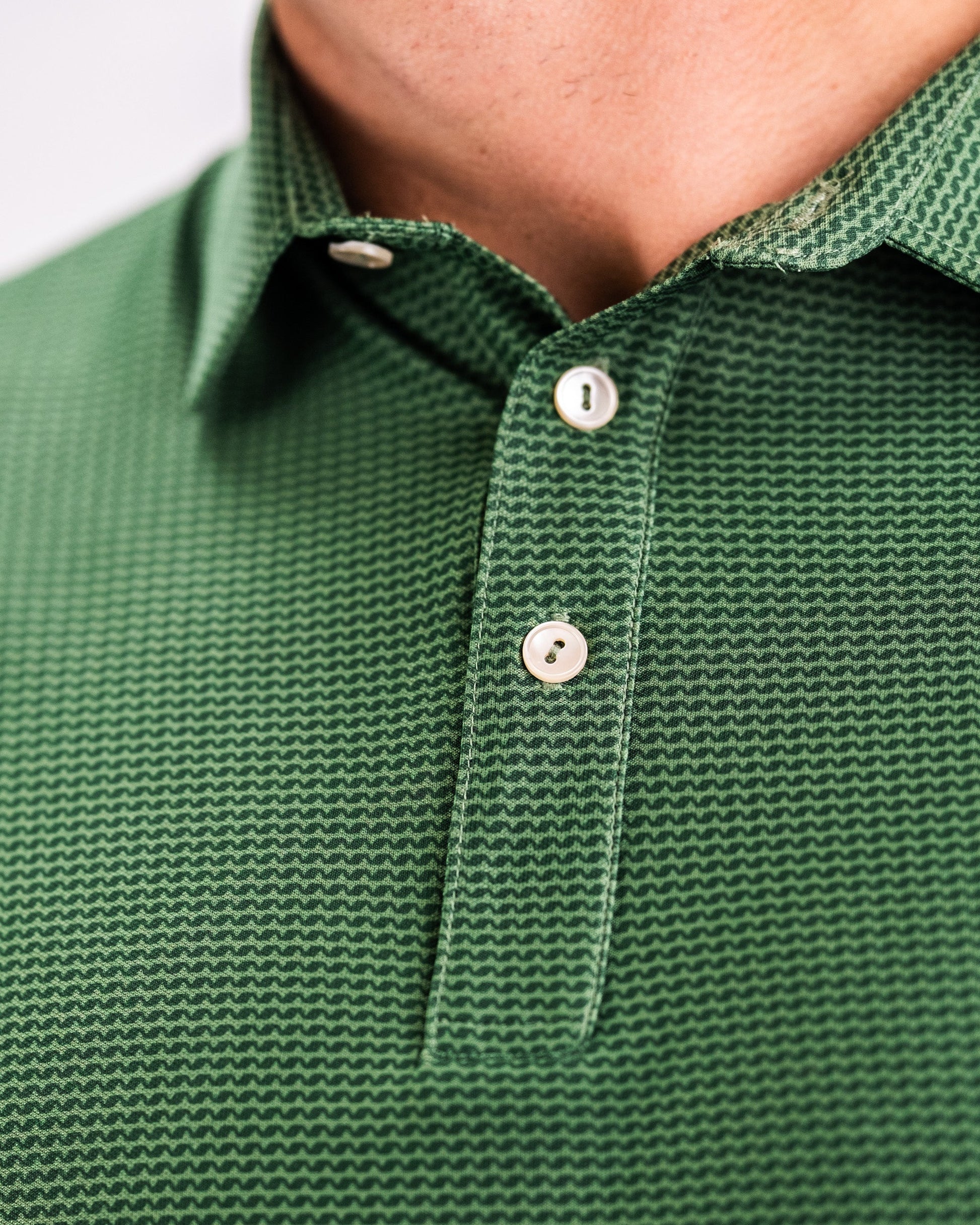 Men's Player Preferred™ Polo in Forest Wave color, featuring a classic design, collared neck, and short sleeves.