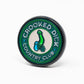 Pop Out Medallion Ball Marker featuring a Crooked Dick design, showcasing vibrant colors and a circular shape for easy use on golf courses.