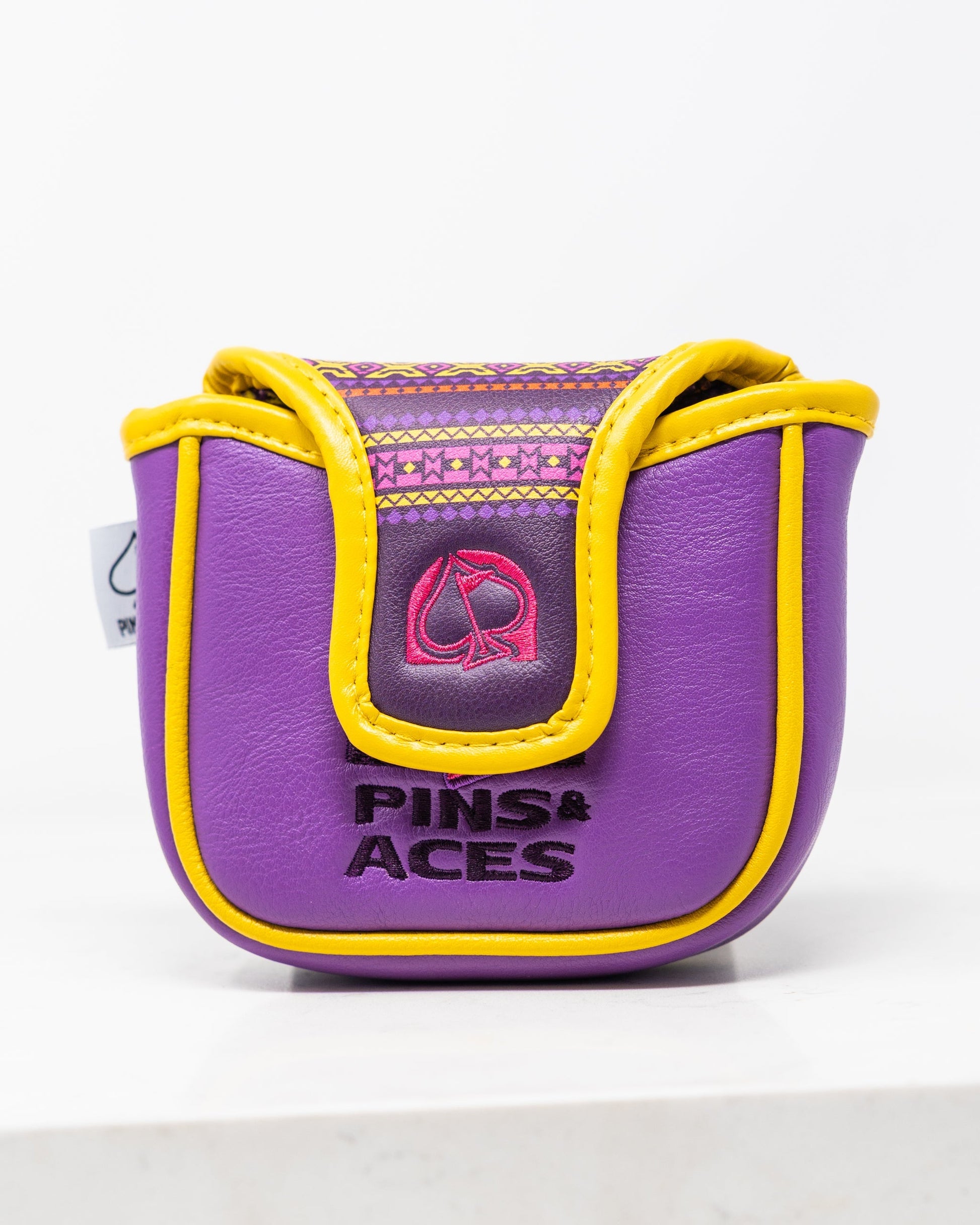 Alt text: "The Bogey Supreme mallet cover featuring a sleek design with vibrant colors and a durable material, designed to protect golf putters."