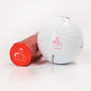 Golf ball and red marker with a middle finger gesture stamp design for humorous or bold marking.
