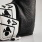 Close-up image of an Ace of Spades blade putter cover, featuring intricate embossed patterns on black faux leather with a prominent black and white Ace of Spades card design.