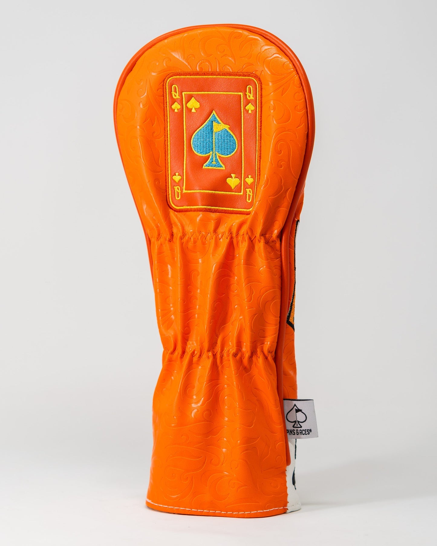 "Orange Crush Queen of Spades fairway cover featuring vibrant colors and bold spade design"