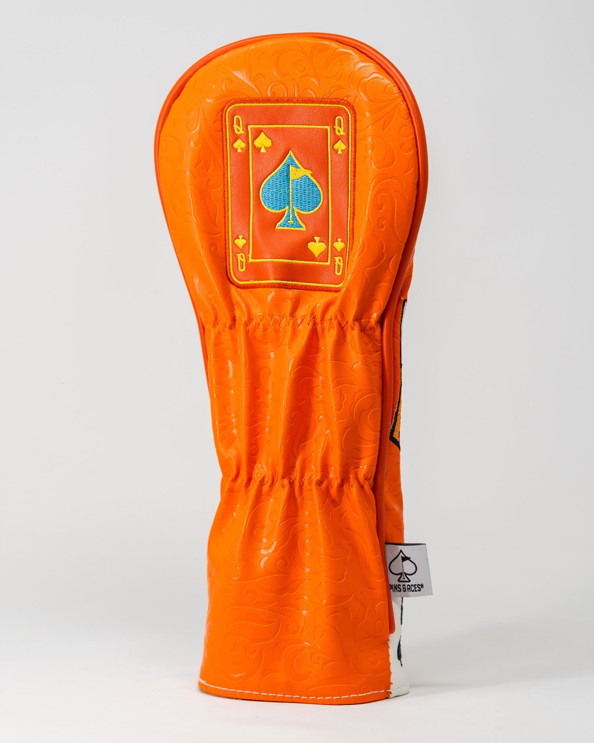 "Orange Crush Queen of Spades fairway cover featuring vibrant colors and bold spade design"